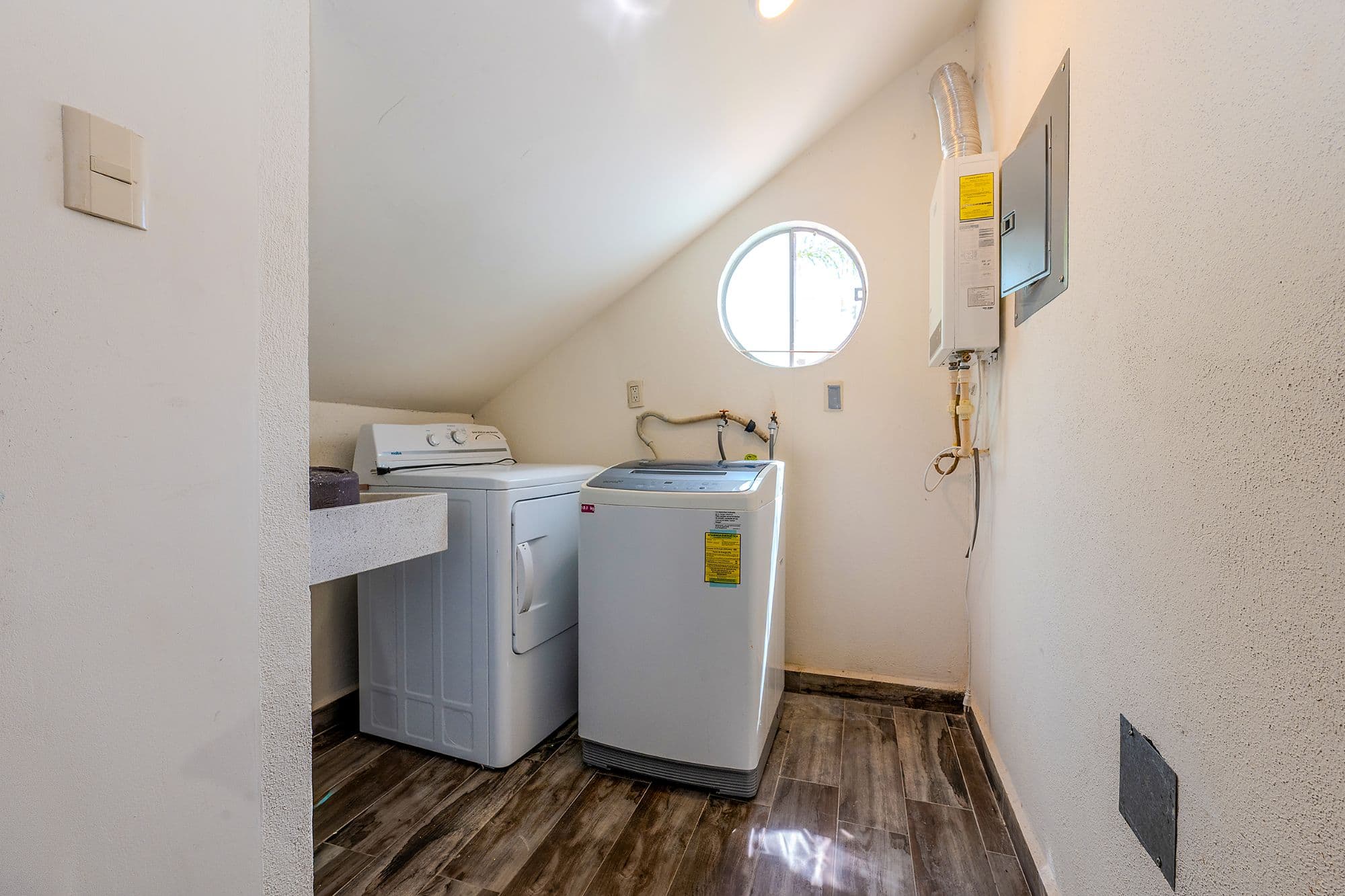 Casita Amanecer — Las Brisas, San Miguel de Allende — photo 7 — bright skylit laundry room, modern amenities