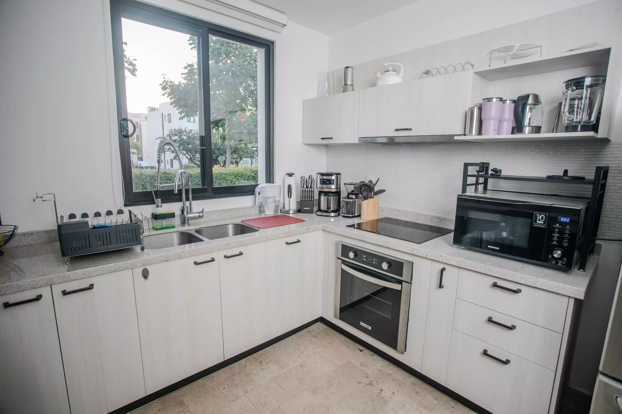 Casa Luminaria — La Luminaria, San Miguel de Allende — photo 21 — modern chef's kitchen, abundant natural light