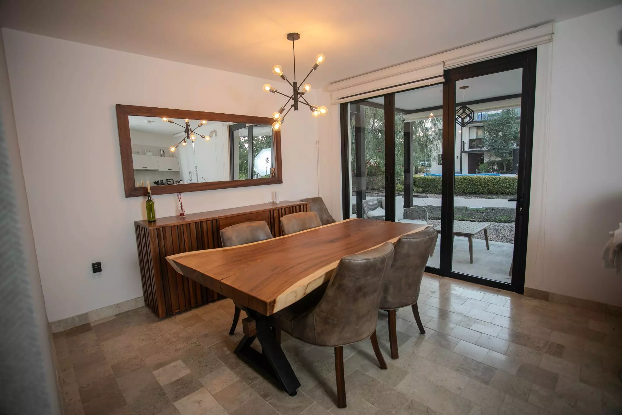 Casa Luminaria — La Luminaria, San Miguel de Allende — photo 19 — modern dining with courtyard views