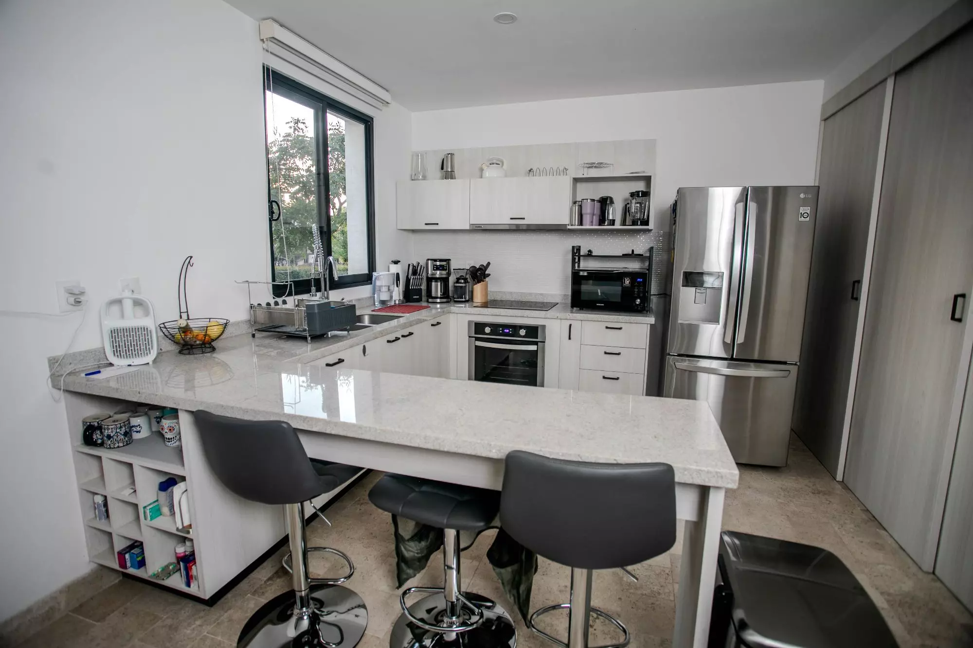 Casa Luminaria — La Luminaria, San Miguel de Allende — photo 20 — contemporary chef's kitchen, gleaming stainless steel