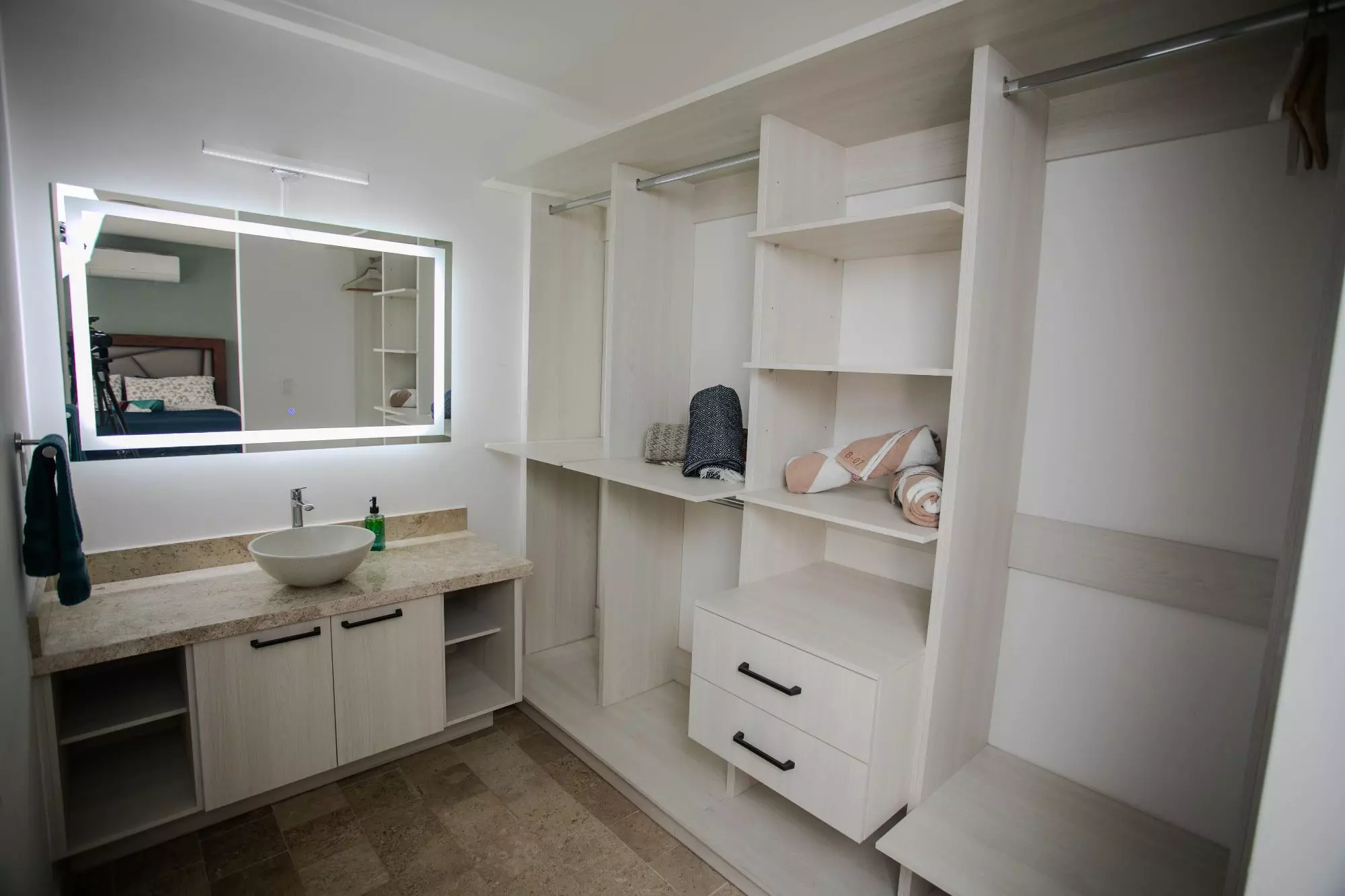 Casa Luminaria — La Luminaria, San Miguel de Allende — photo 11 — spa-like ensuite with custom cabinetry