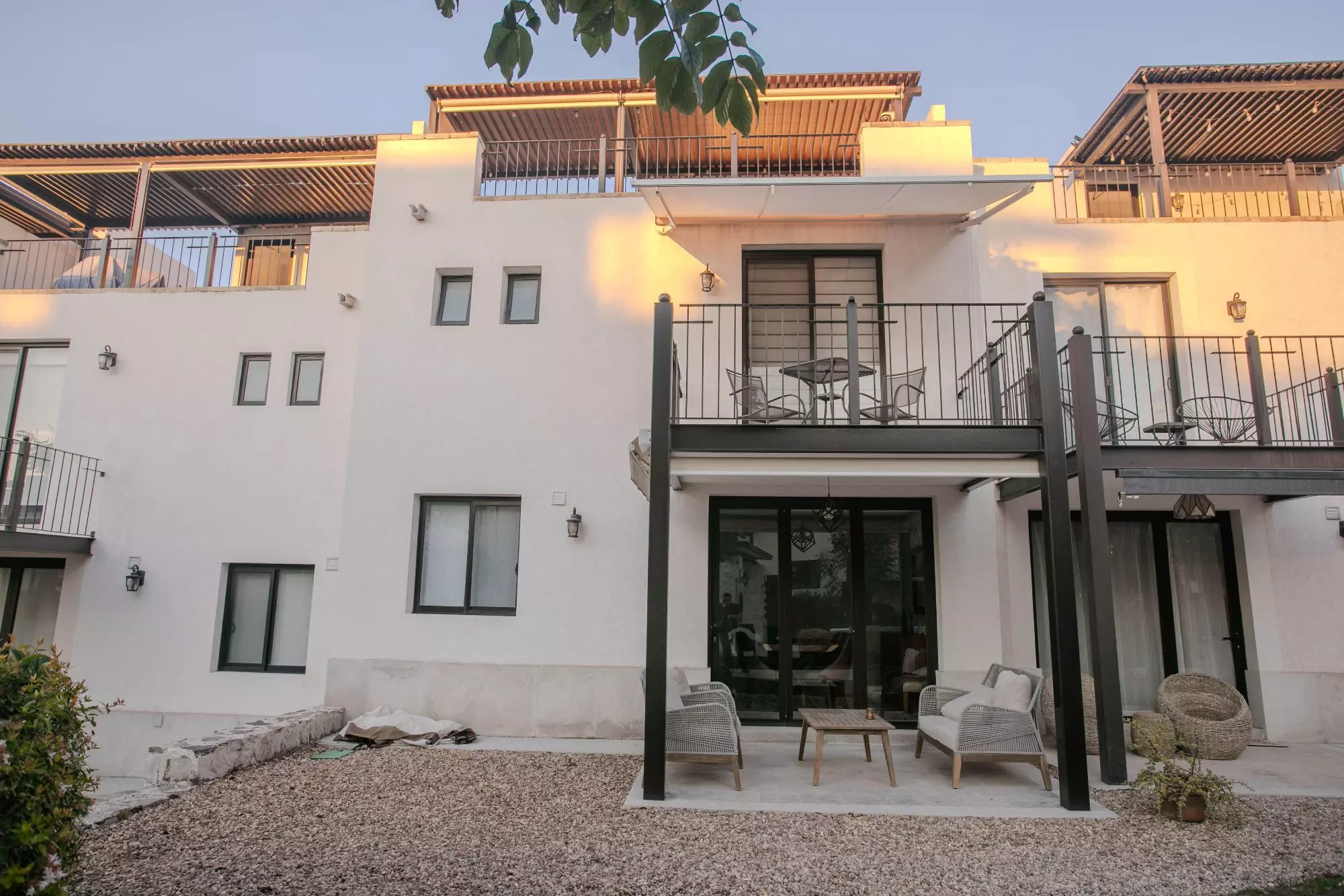 Casa Luminaria — La Luminaria, San Miguel de Allende — photo 18 — golden hour courtyard with modern elegance