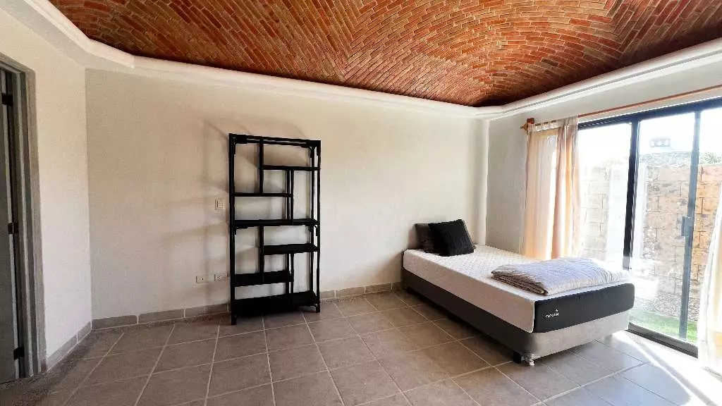 Villa 2 R 2 B En Rancho Labradores — Los Labradores, San Miguel de Allende — photo 2 — serene primary suite, soaring brick ceilings