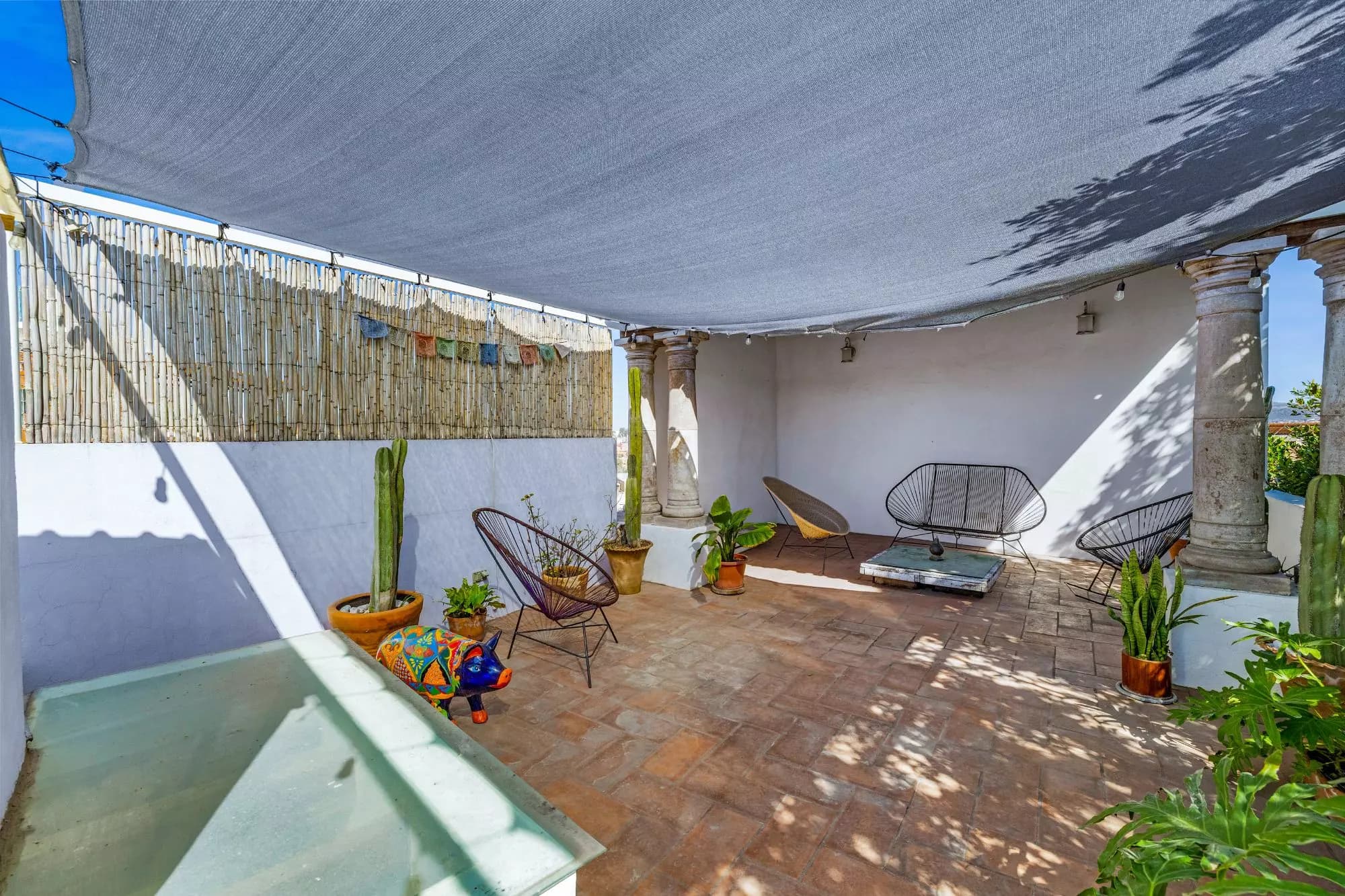 Casa Entre Arboles — San Antonio, San Miguel de Allende — photo 28 — sun-drenched rooftop terrace with architectural charm