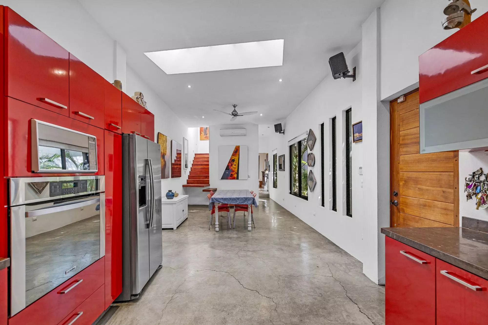 Casa Entre Arboles — San Antonio, San Miguel de Allende — photo 15 — vibrant modern kitchen, soaring ceilings