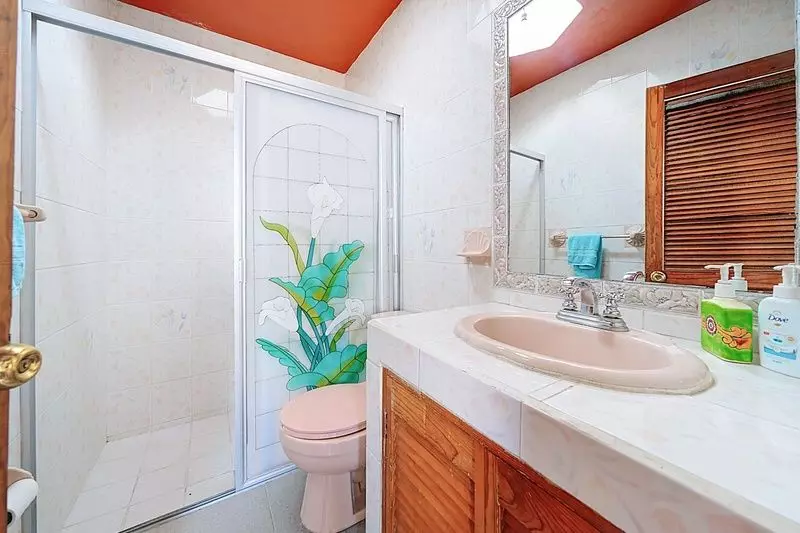 La Casona de Montitlan — Balcones, San Miguel de Allende — photo 18 — vibrant, light-filled spa bathroom