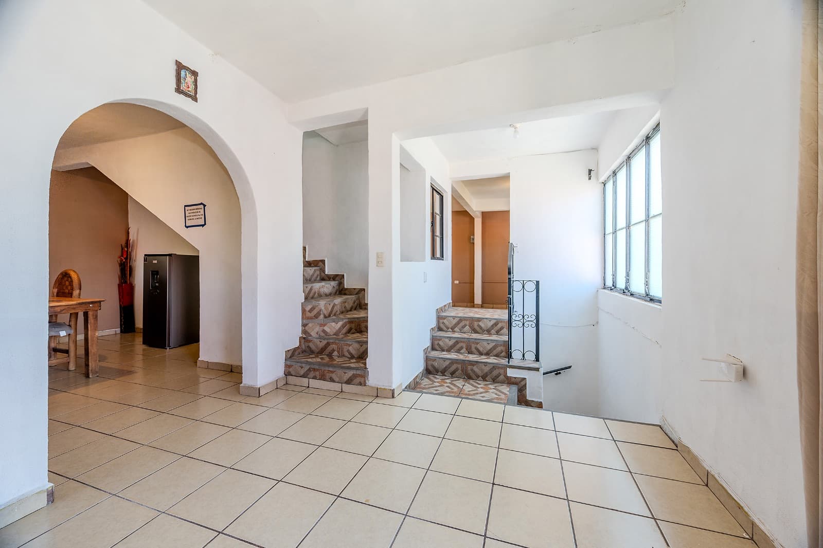 Casa Nueva Aurora — Aurora, San Miguel de Allende — photo 6 — bright, airy entry with architectural charm