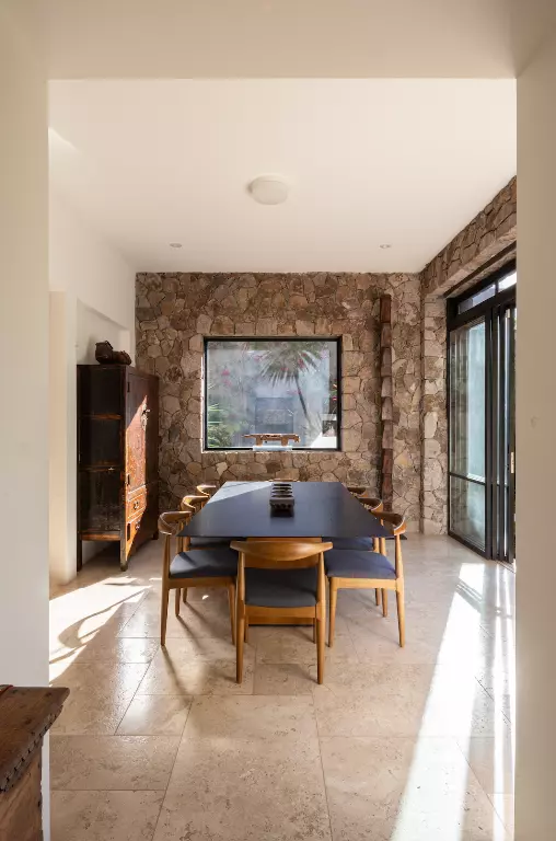 Casa Luz — Balcones, San Miguel de Allende — photo 10 — luminous dining room, rustic stone charm