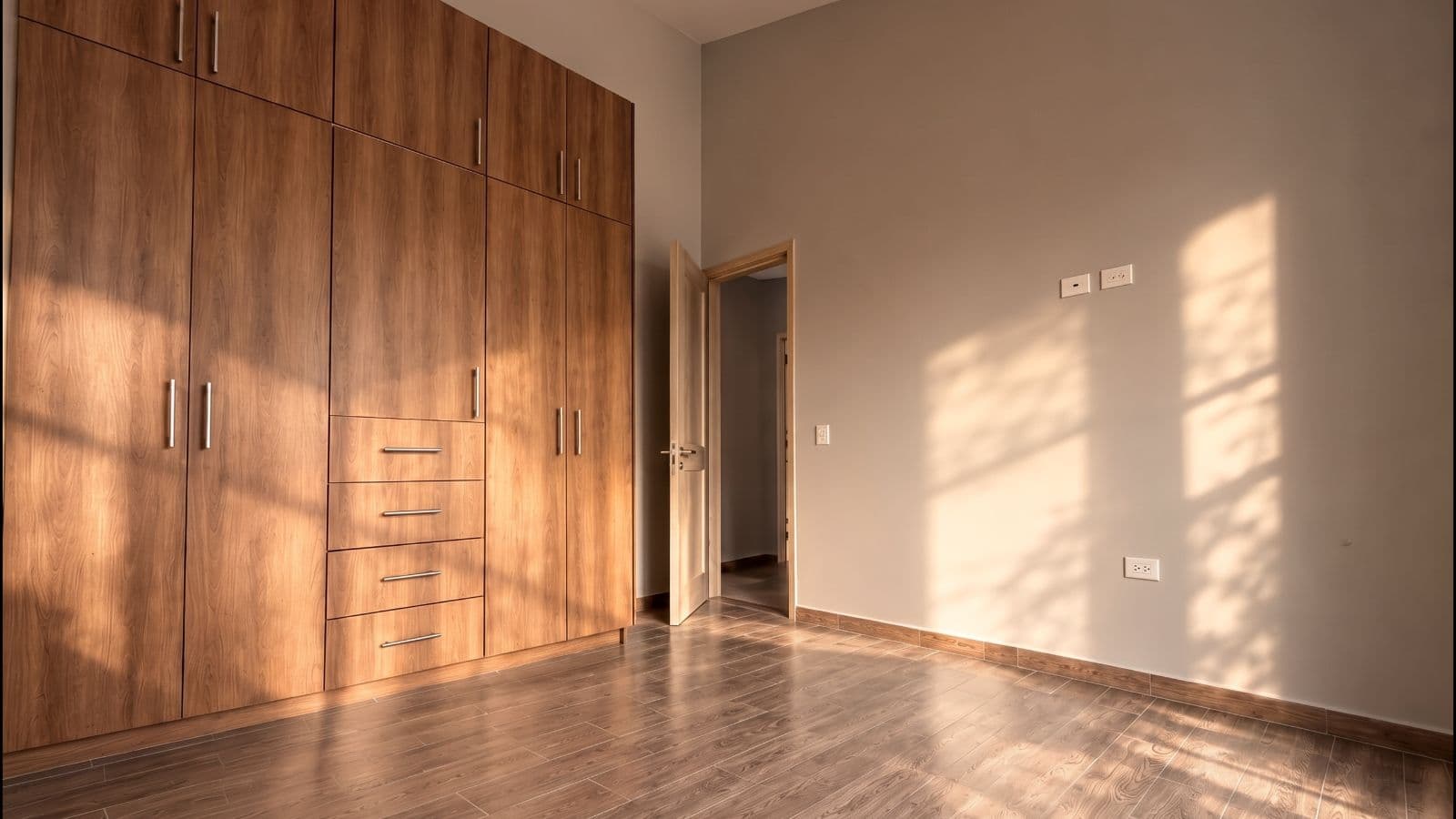 Casa Aura — Antigua Residencial, San Miguel de Allende — photo 15 — luminous bedroom, artisan wood cabinetry