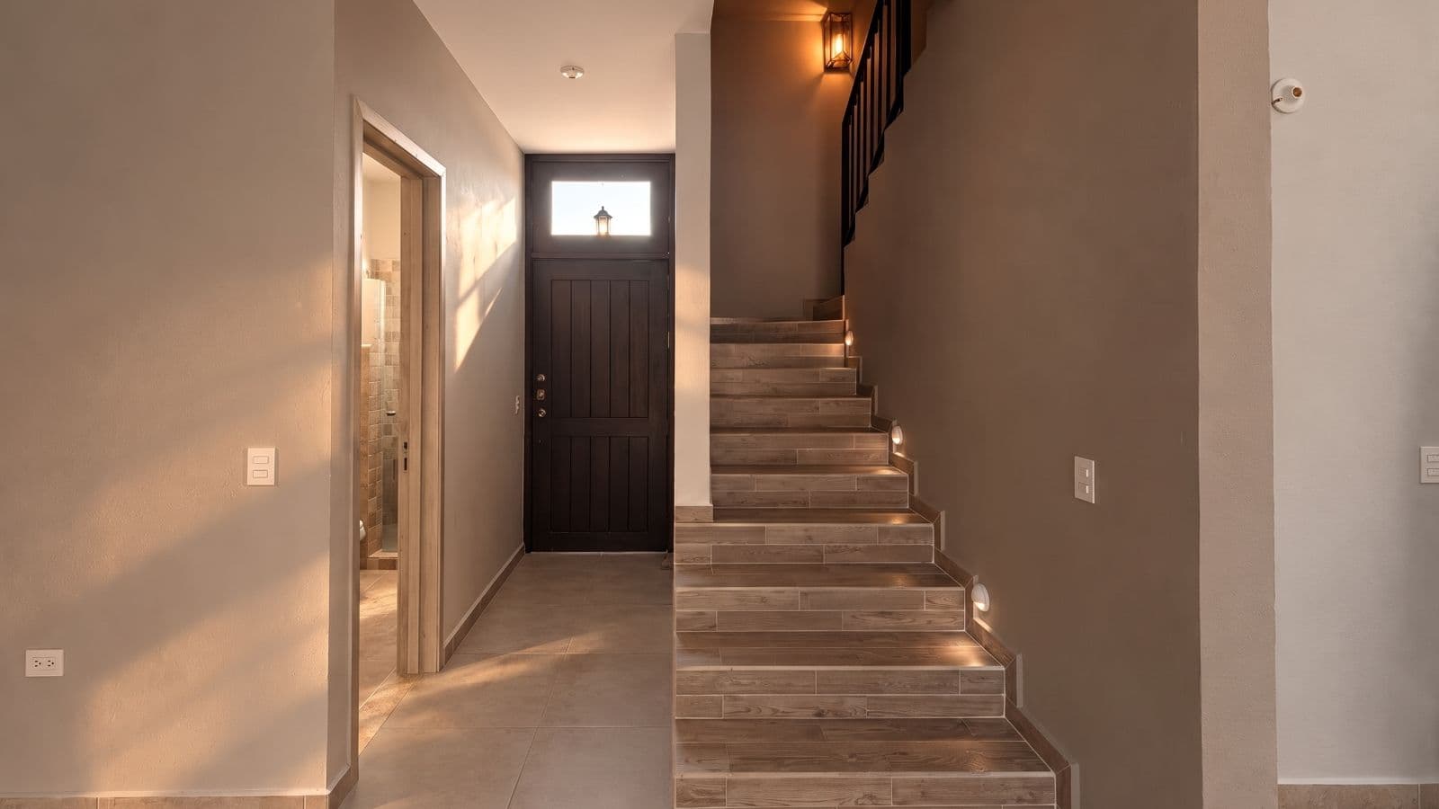 Casa Aura — Antigua Residencial, San Miguel de Allende — photo 12 — elegant entry with warm architectural details