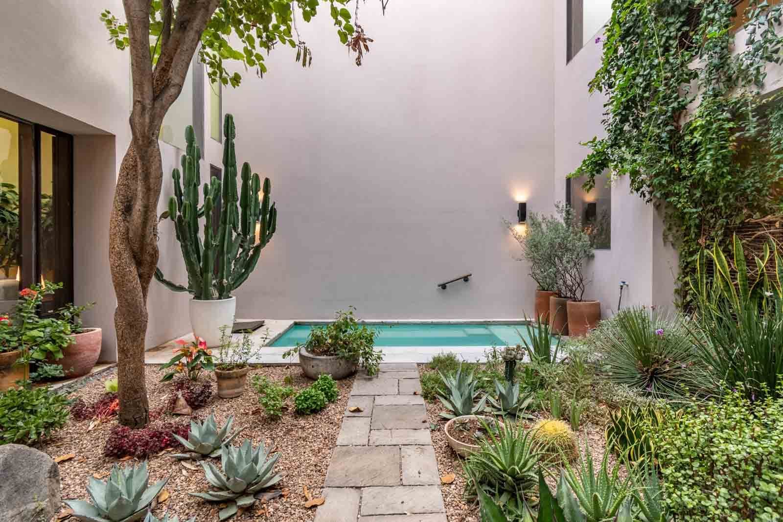 Casa Doce — Centro, San Miguel de Allende — photo 11 — serene courtyard pool oasis, lush gardens