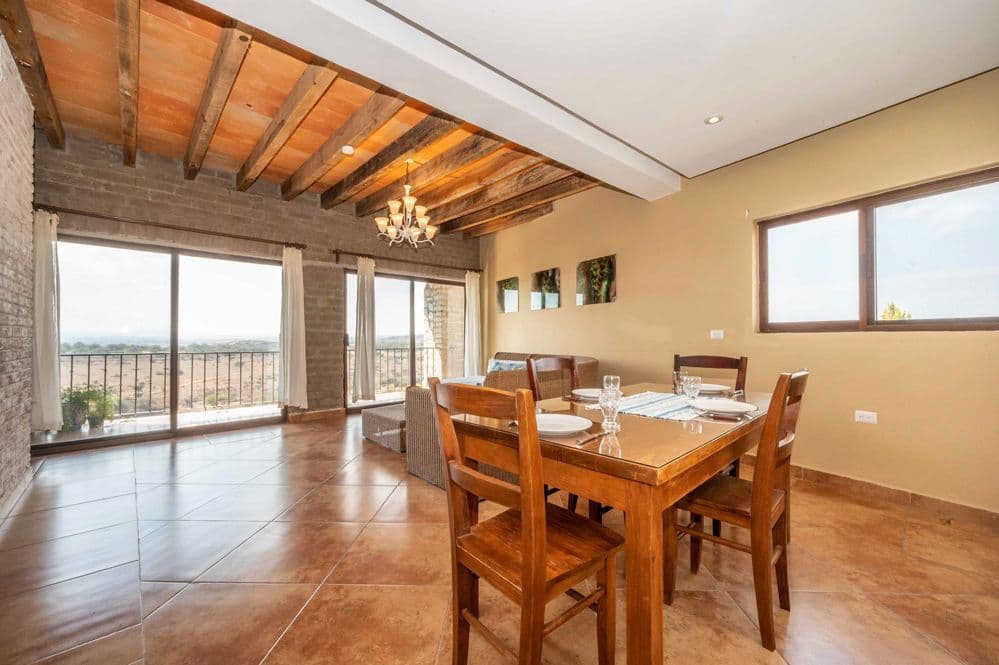 Casa Cactus — El Cortijo, San Miguel de Allende — photo 20 — soaring beams, panoramic valley views, elegant dining