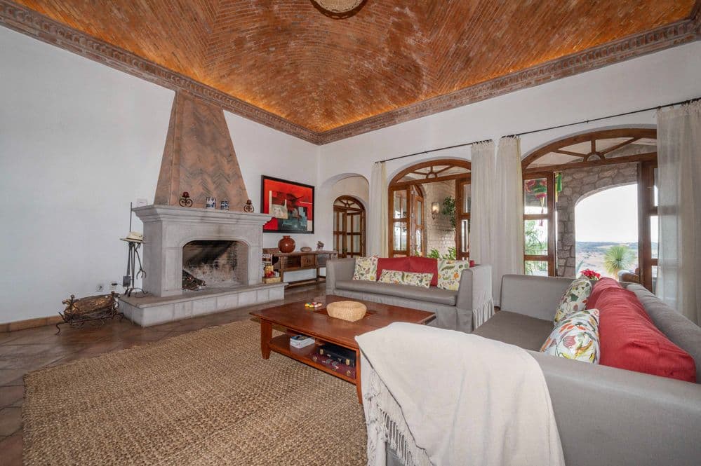 Casa Cactus — El Cortijo, San Miguel de Allende — photo 8 — soaring wood ceilings, luminous living space