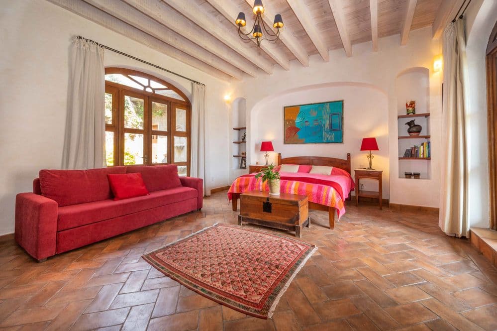 Casa Cactus — El Cortijo, San Miguel de Allende — photo 9 — luminous colonial master suite, authentically appointed