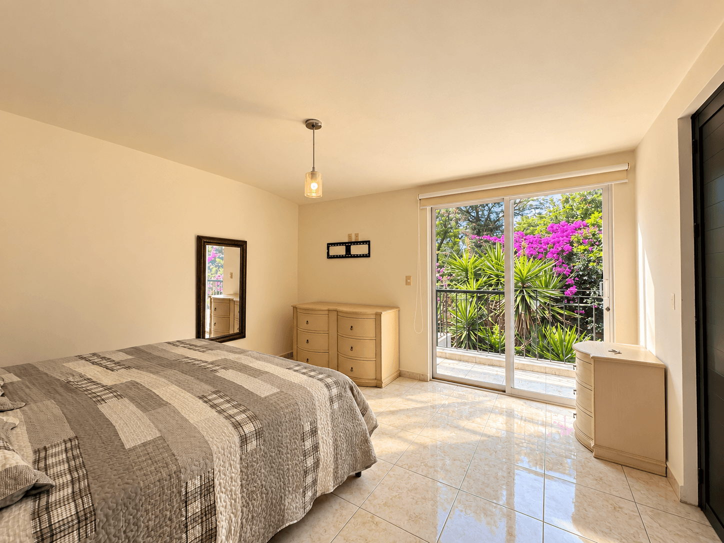 Casa Cortijo — El Cortijo, San Miguel de Allende — photo 11 — luminous master suite, garden views