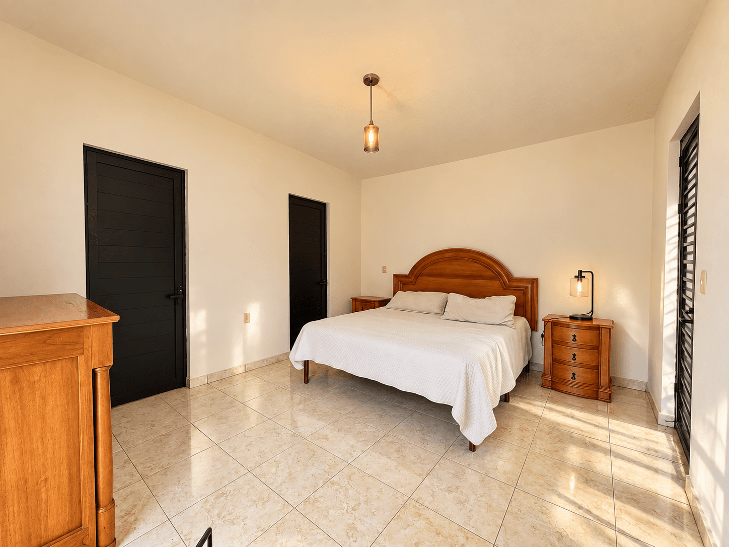 Casa Cortijo — El Cortijo, San Miguel de Allende — photo 8 — sun-drenched master bedroom, terracotta charm