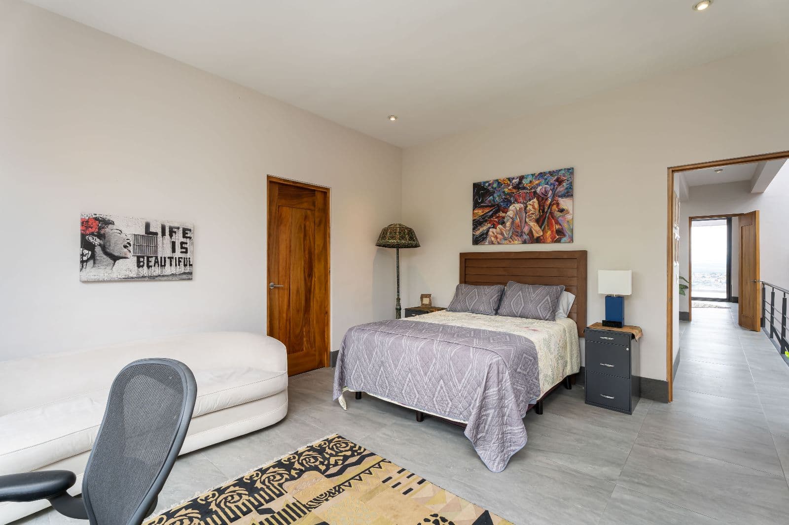 Casa Iluminada — Balcones, San Miguel de Allende — photo 14 — serene master suite with refined elegance