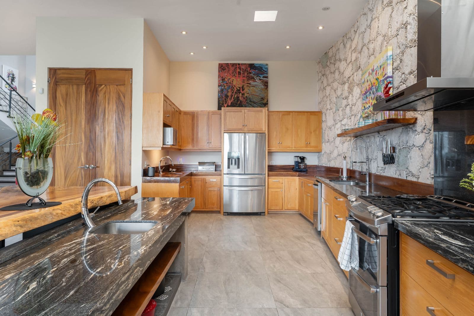 Casa Iluminada — Balcones, San Miguel de Allende — photo 5 — contemporary luxury kitchen with warmth