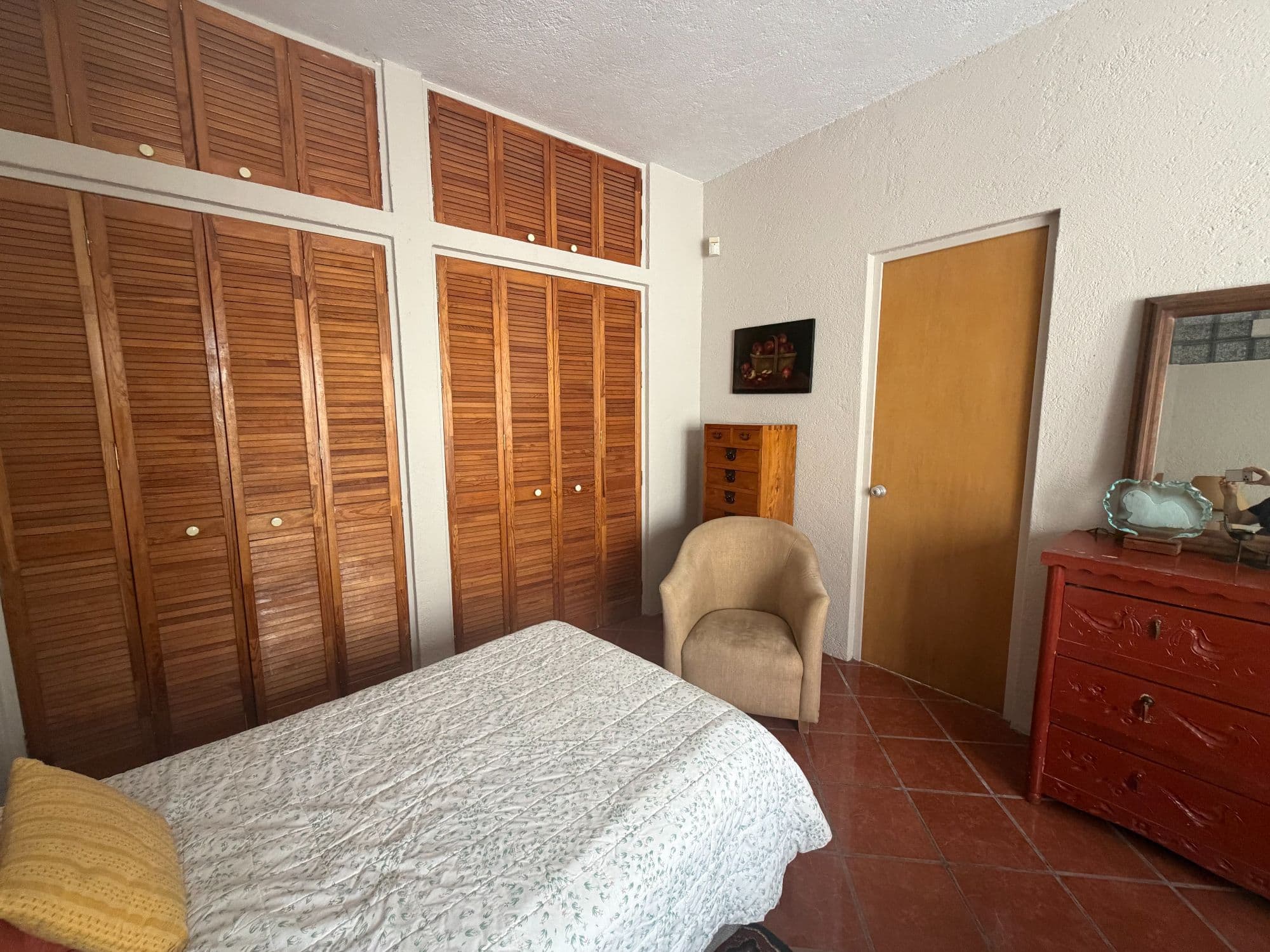 Casa Clinton — Caracol, San Miguel de Allende — photo 18 — spacious bedroom, authentic wooden closets