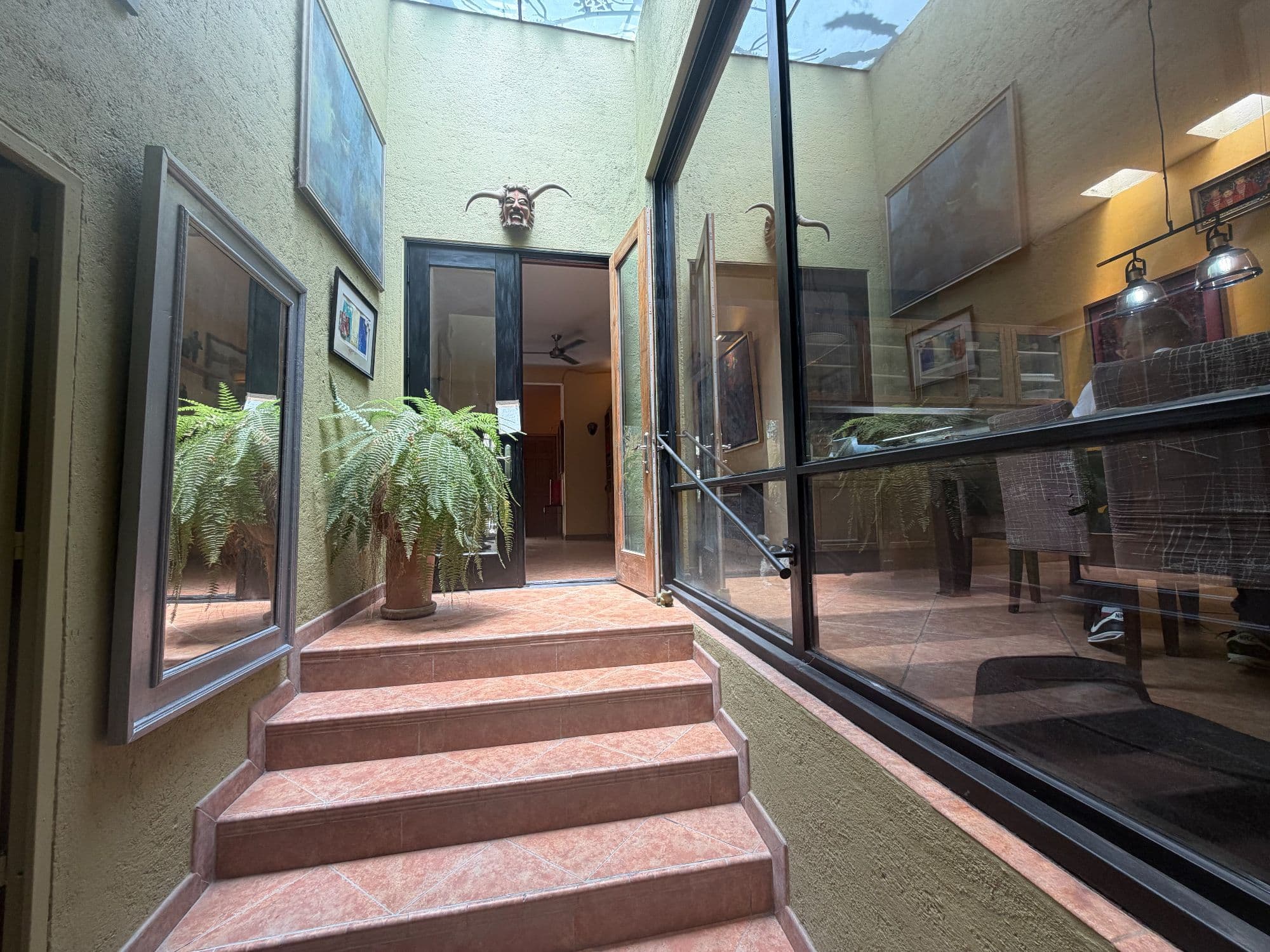 Casa Clinton — Caracol, San Miguel de Allende — photo 25 — charming courtyard with soaring skylights