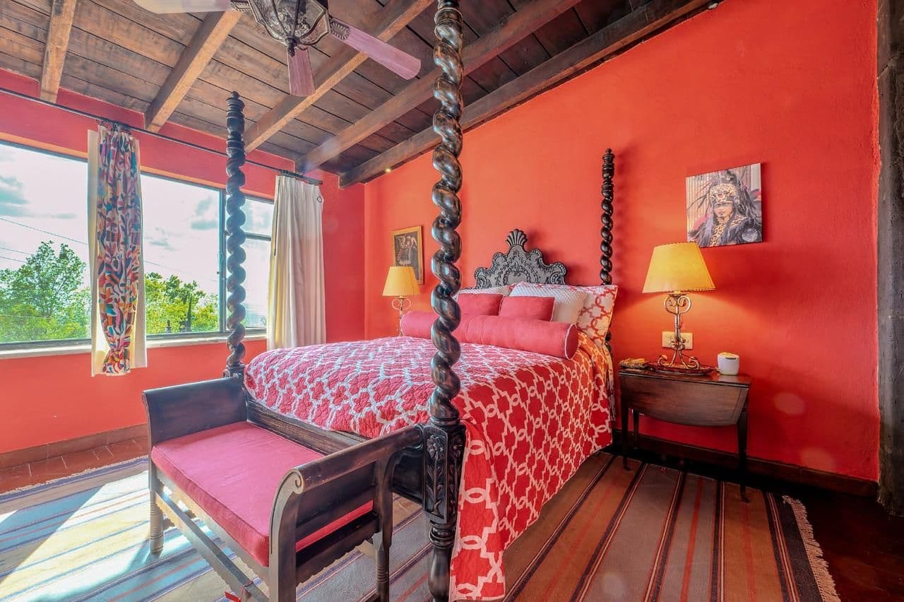 Casa Java — Atascadero (Arcos de San Miguel), San Miguel de Allende — photo 25 — vibrant colonial bedroom, architectural splendor