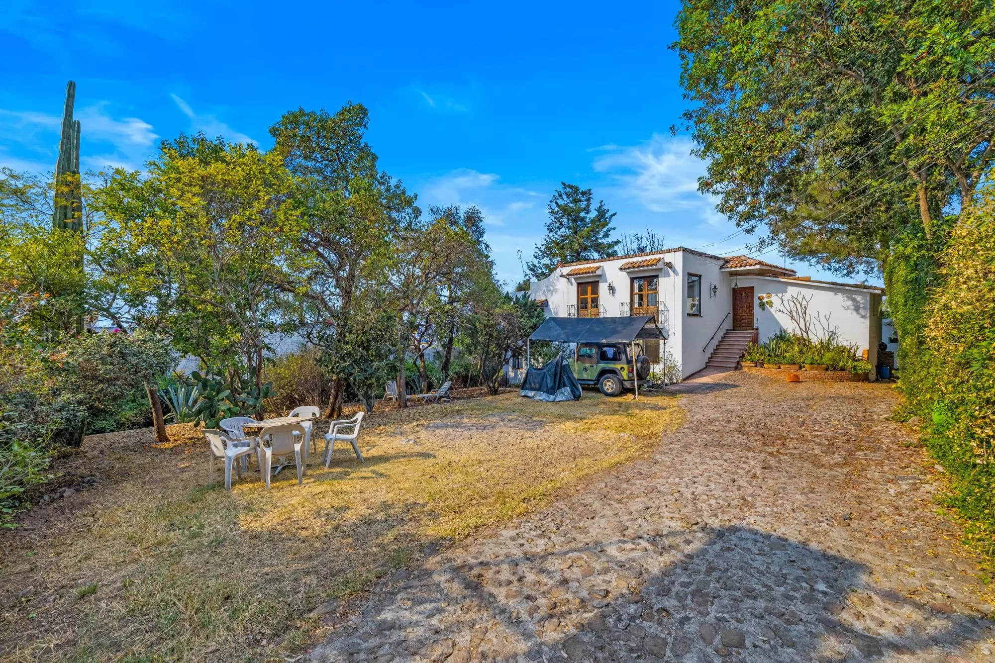The Hidden House — Rinconada de Los Balcones, San Miguel de Allende — photo 22 — rustic charm with mature garden setting