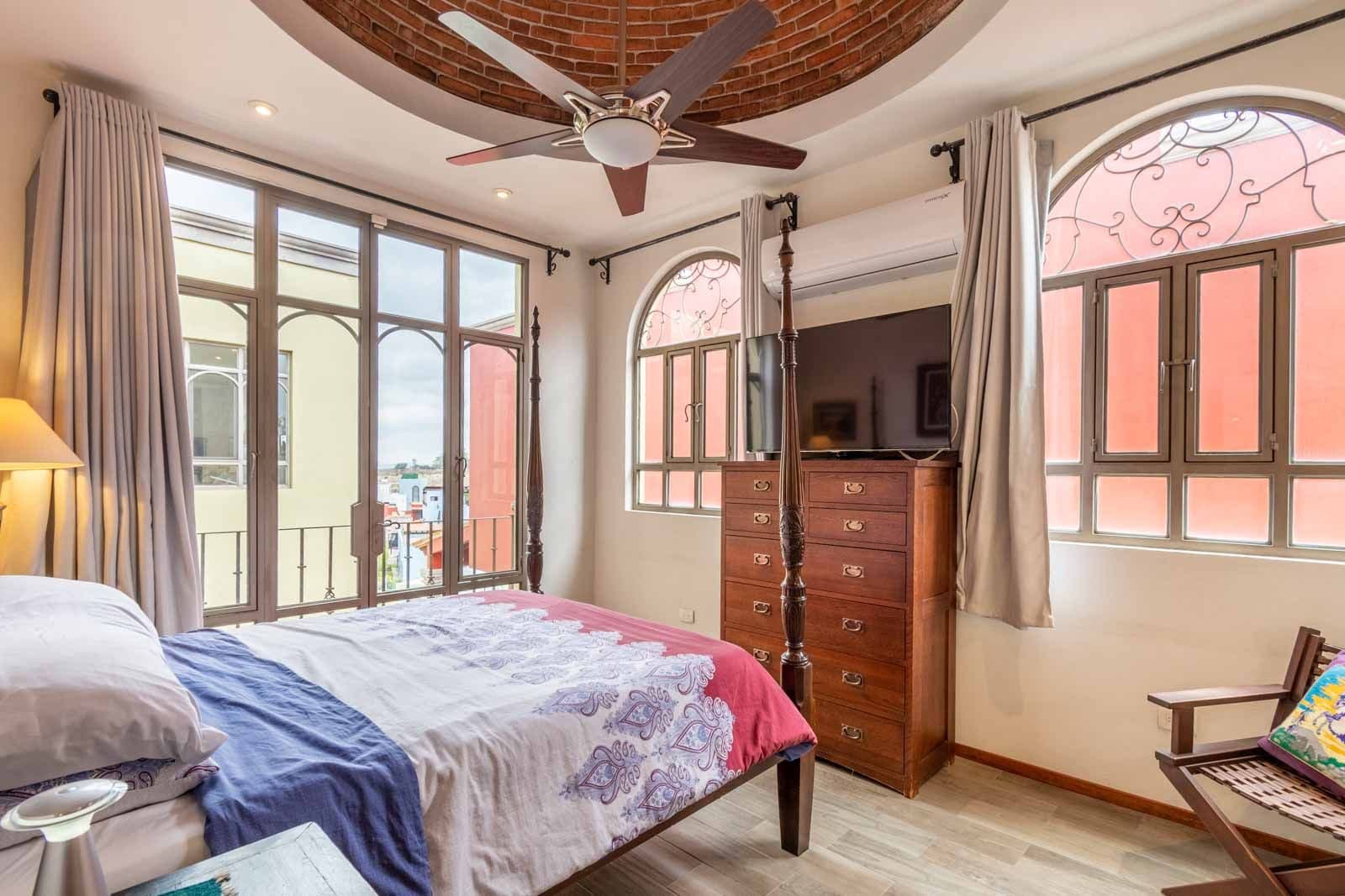 Casa Dar — El Capricho, San Miguel de Allende — photo 18 — sunlit master suite, architectural elegance
