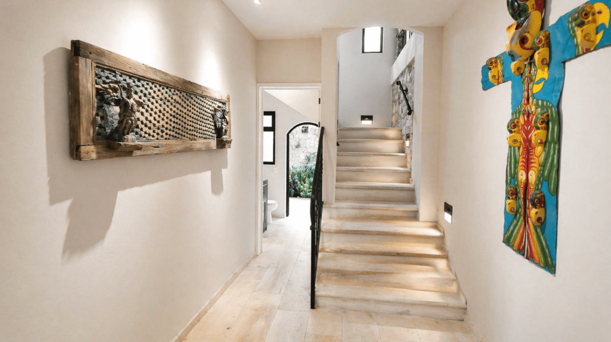 Casa Zen — El Obraje, San Miguel de Allende — photo 10 — luminous stairwell, artisan-adorned passage