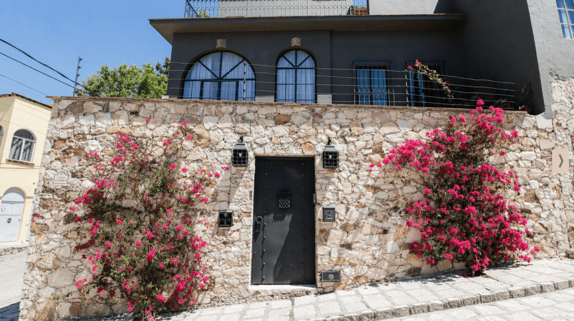 Casa Zen — El Obraje, San Miguel de Allende — photo 3 — charming colonial stone facade, vibrant bougainvillea