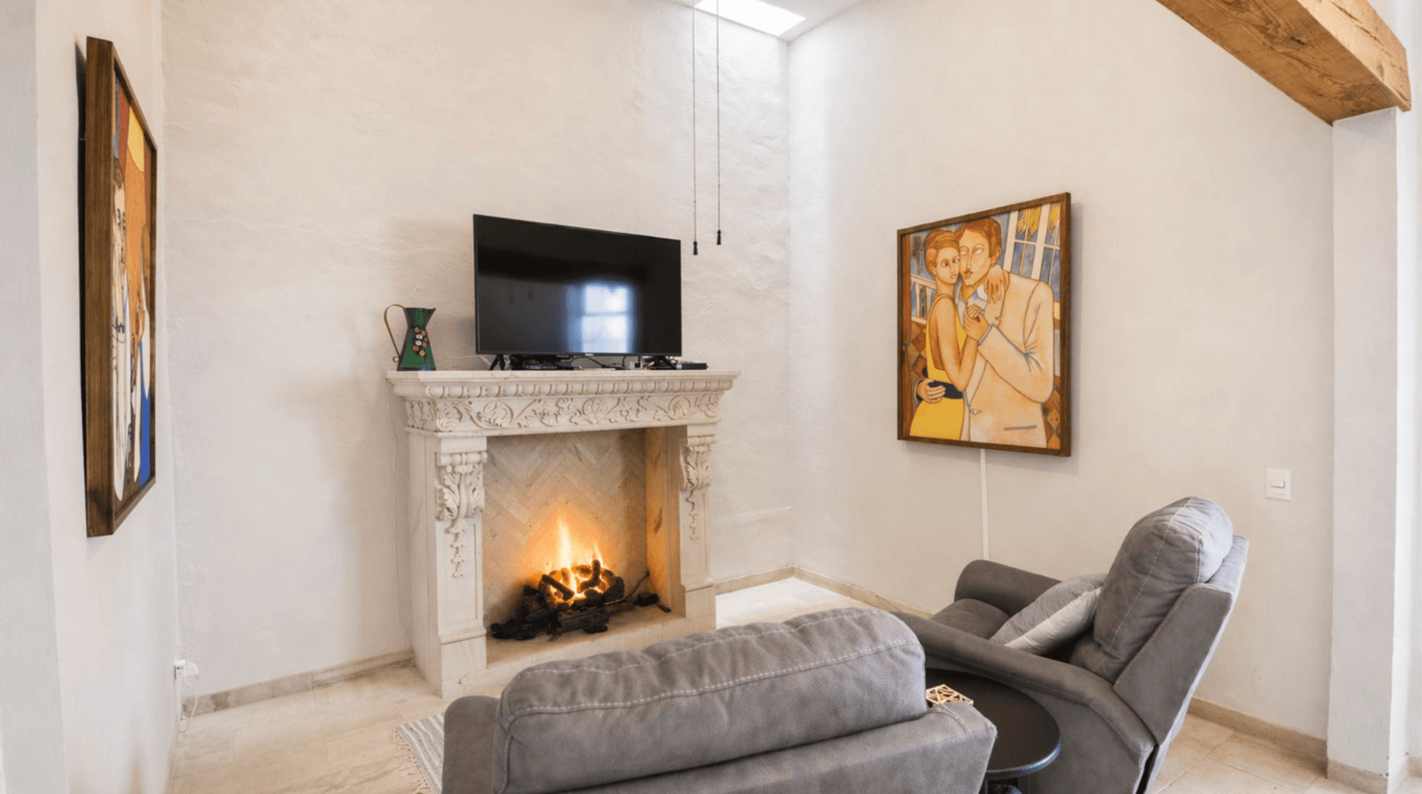 Casa Zen — El Obraje, San Miguel de Allende — photo 12 — elegant fireplace lounge with ambient warmth