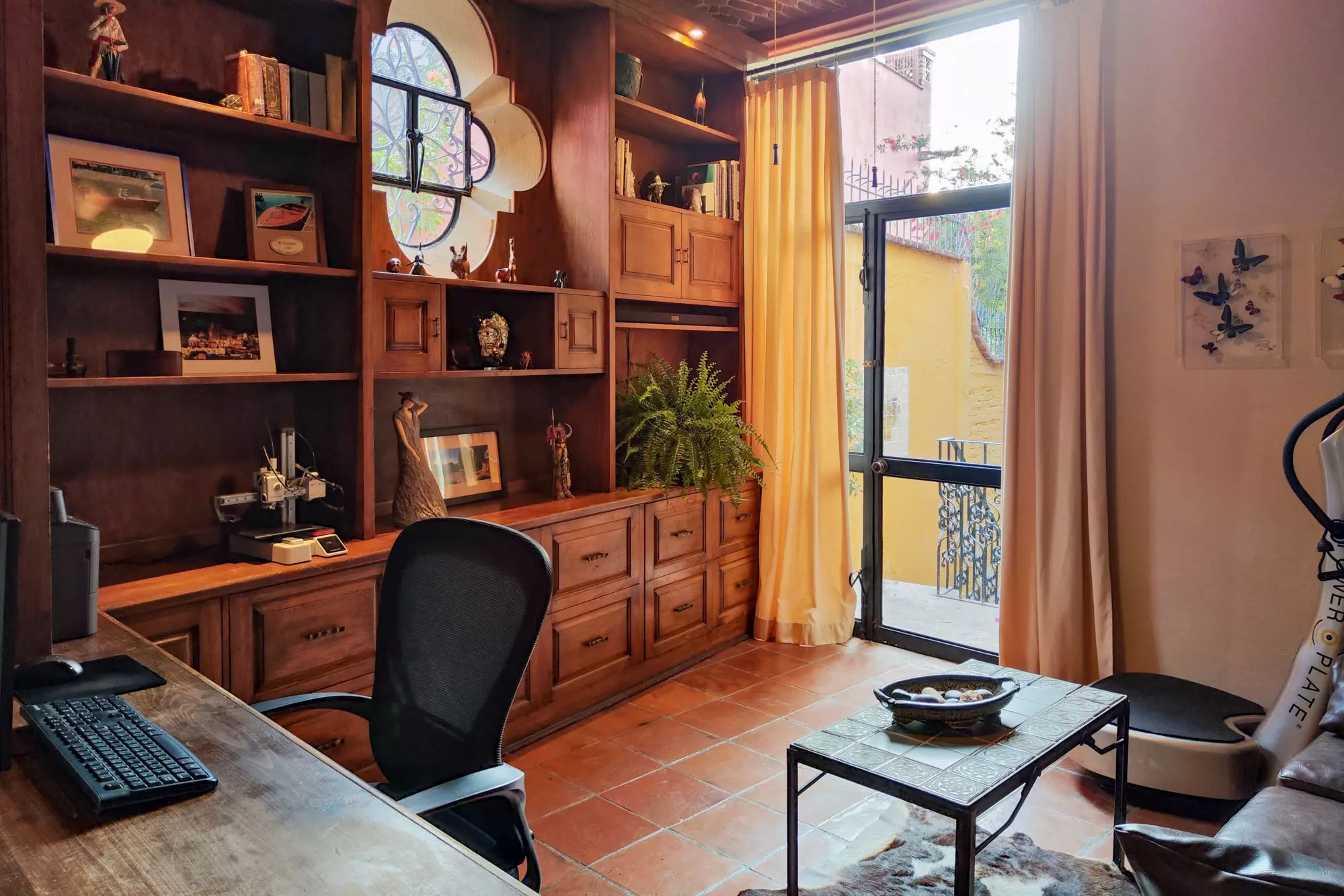 Casa Colina — Balcones, San Miguel de Allende — photo 17 — sophisticated wooden study with terrace views