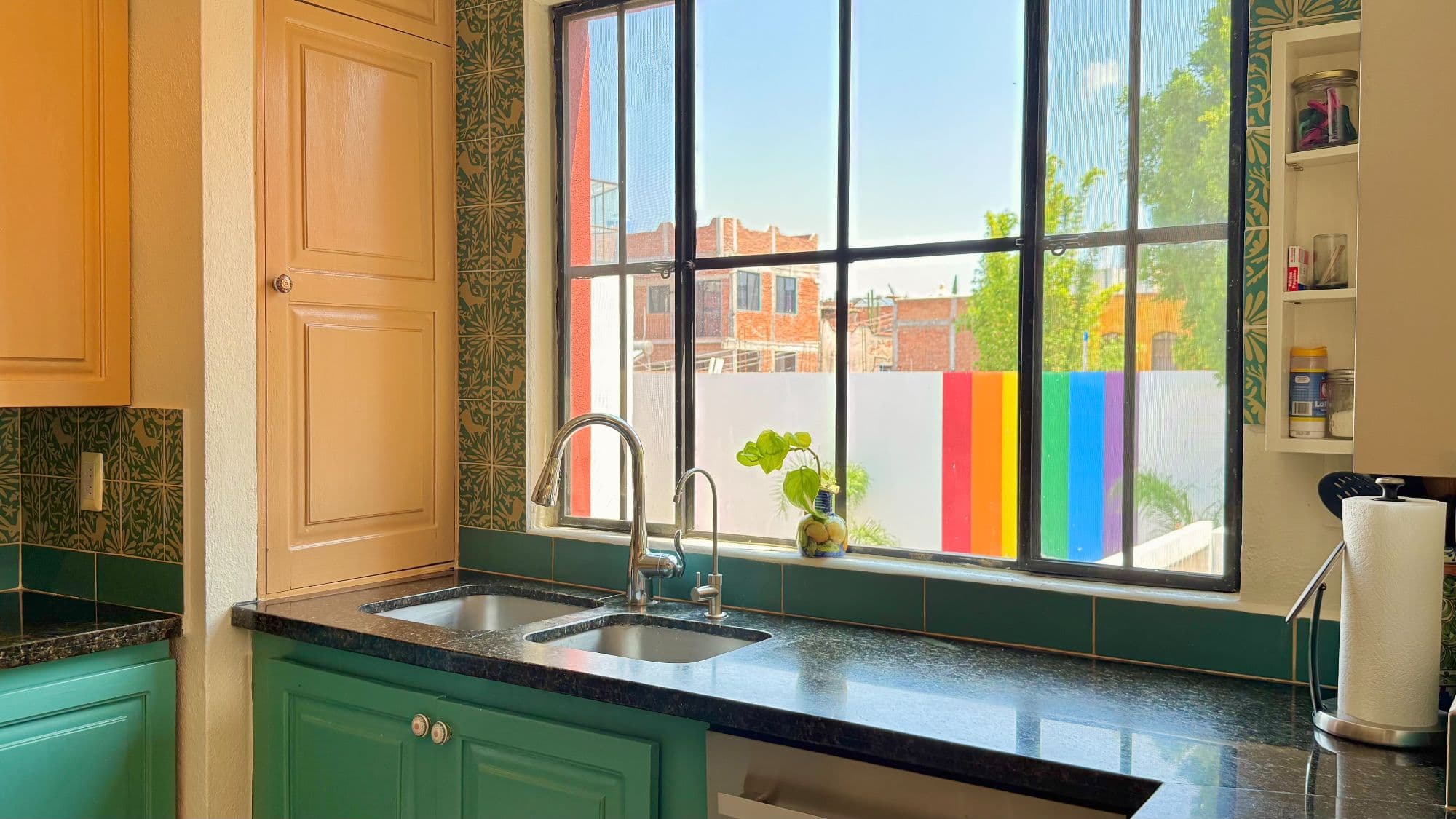 Casa Esperanza San Antonio — San Antonio, San Miguel de Allende — photo 10 — vibrant contemporary kitchen with skyline views