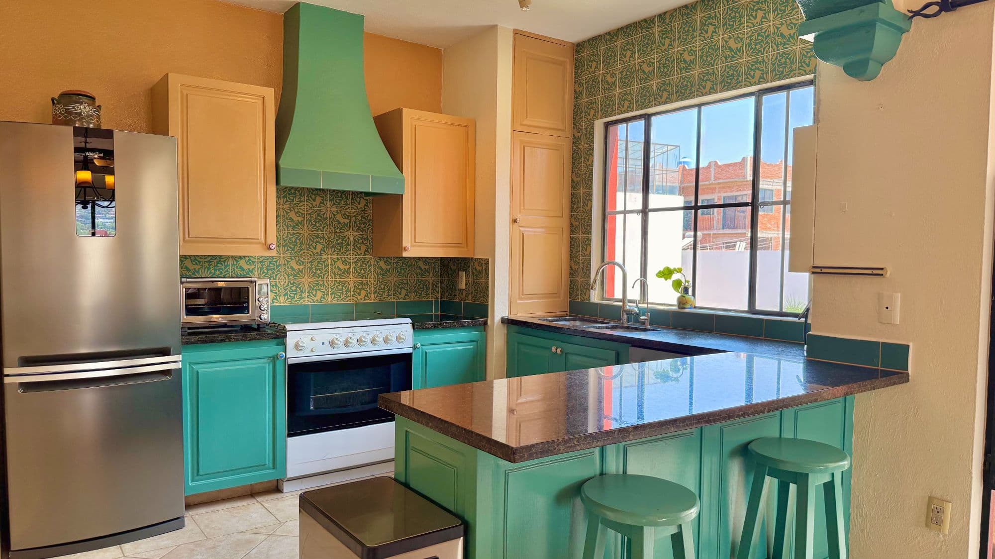 Casa Esperanza San Antonio — San Antonio, San Miguel de Allende — photo 8 — vibrant artisan kitchen with abundant natural light