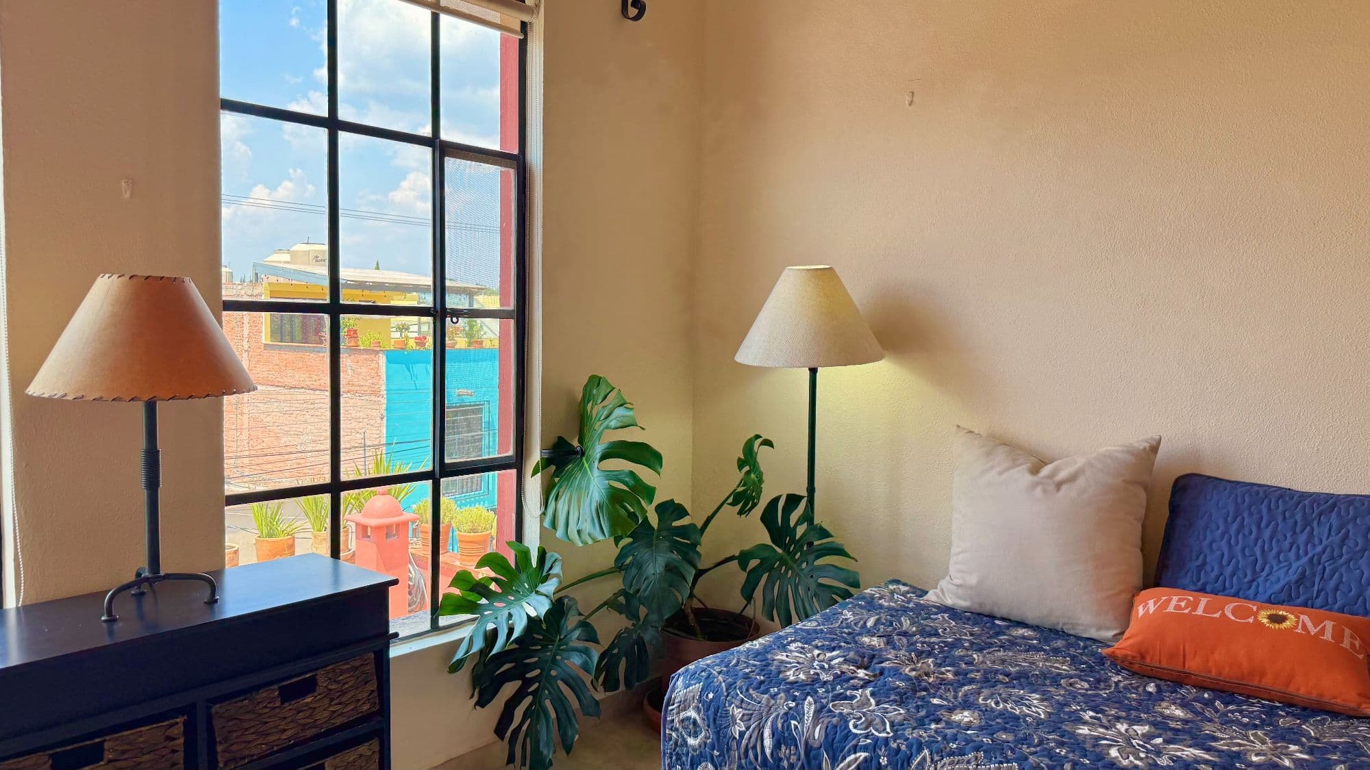 Casa Esperanza San Antonio — San Antonio, San Miguel de Allende — photo 14 — bright bedroom with panoramic rooftop views