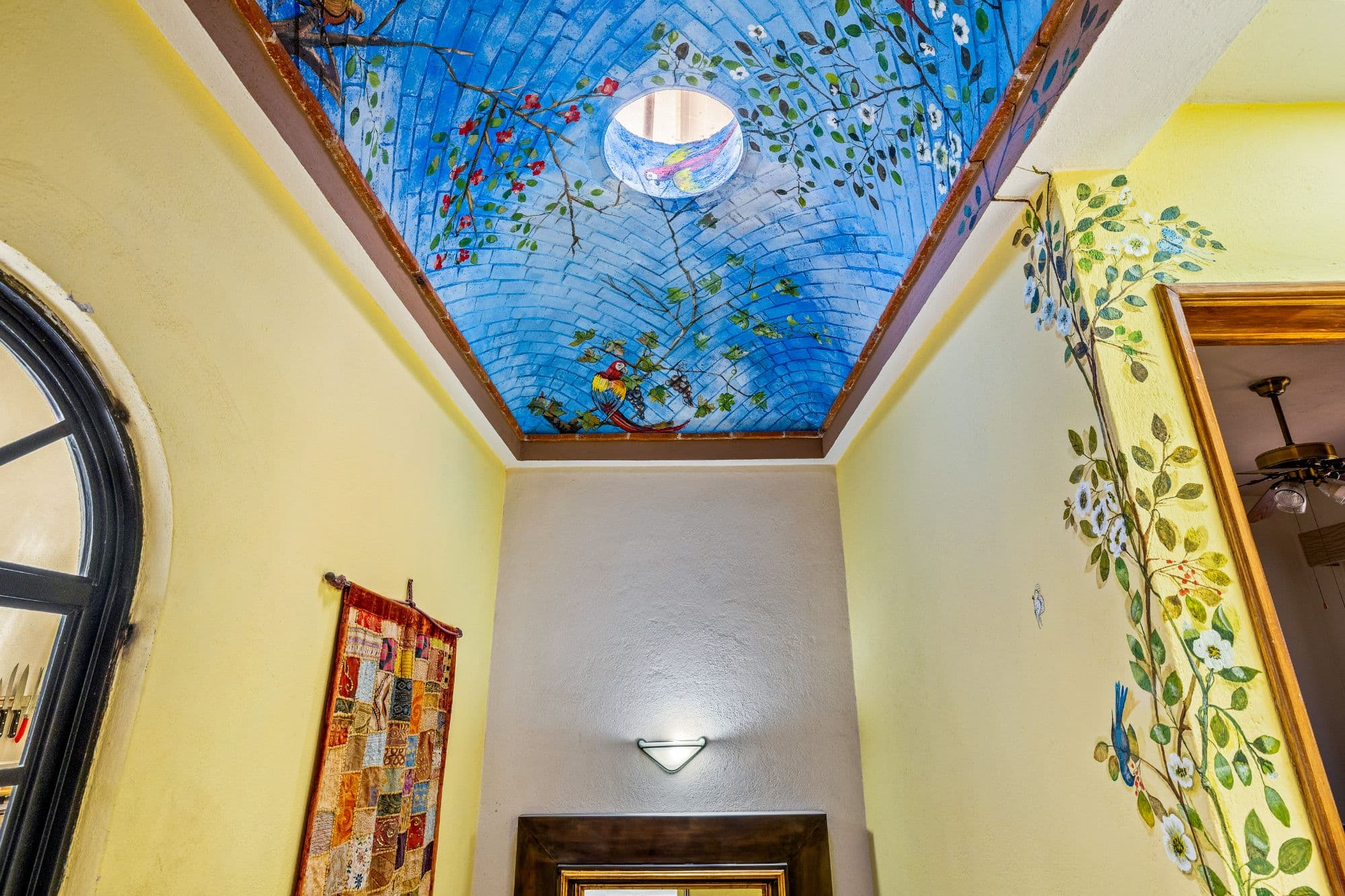 Casa Eclipse — La Lejona, San Miguel de Allende — photo 18 — luminous skylit entry, artisan-crafted ceiling