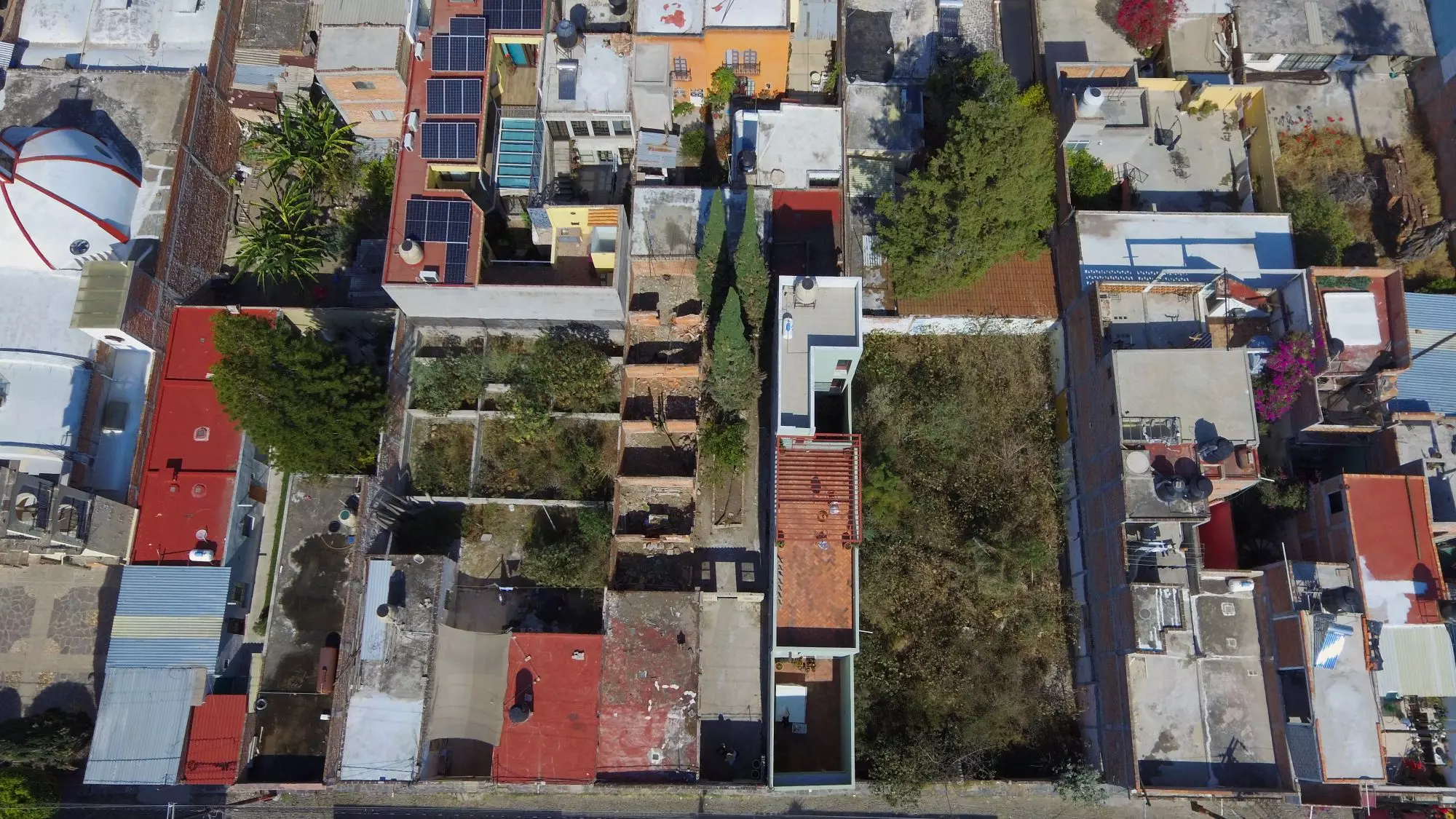 PRIME LOT — Guadalupe, San Miguel de Allende — photo 2 — vibrant neighborhood aerial, charming architectural tapestry