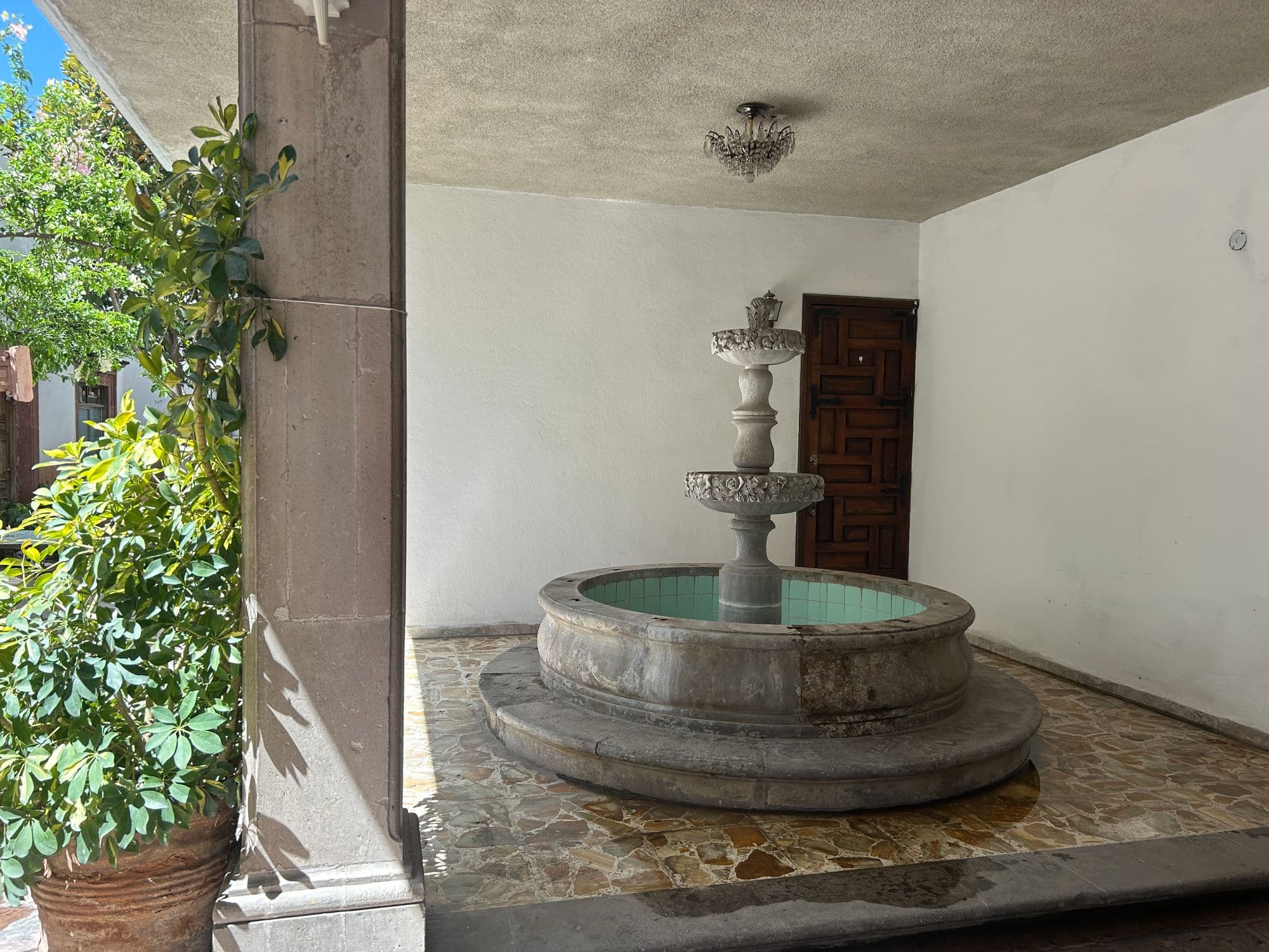 Casa Naranjo — San Miguel de Allende Centro, San Miguel de Allende — photo 2 — serene courtyard with historic fountain
