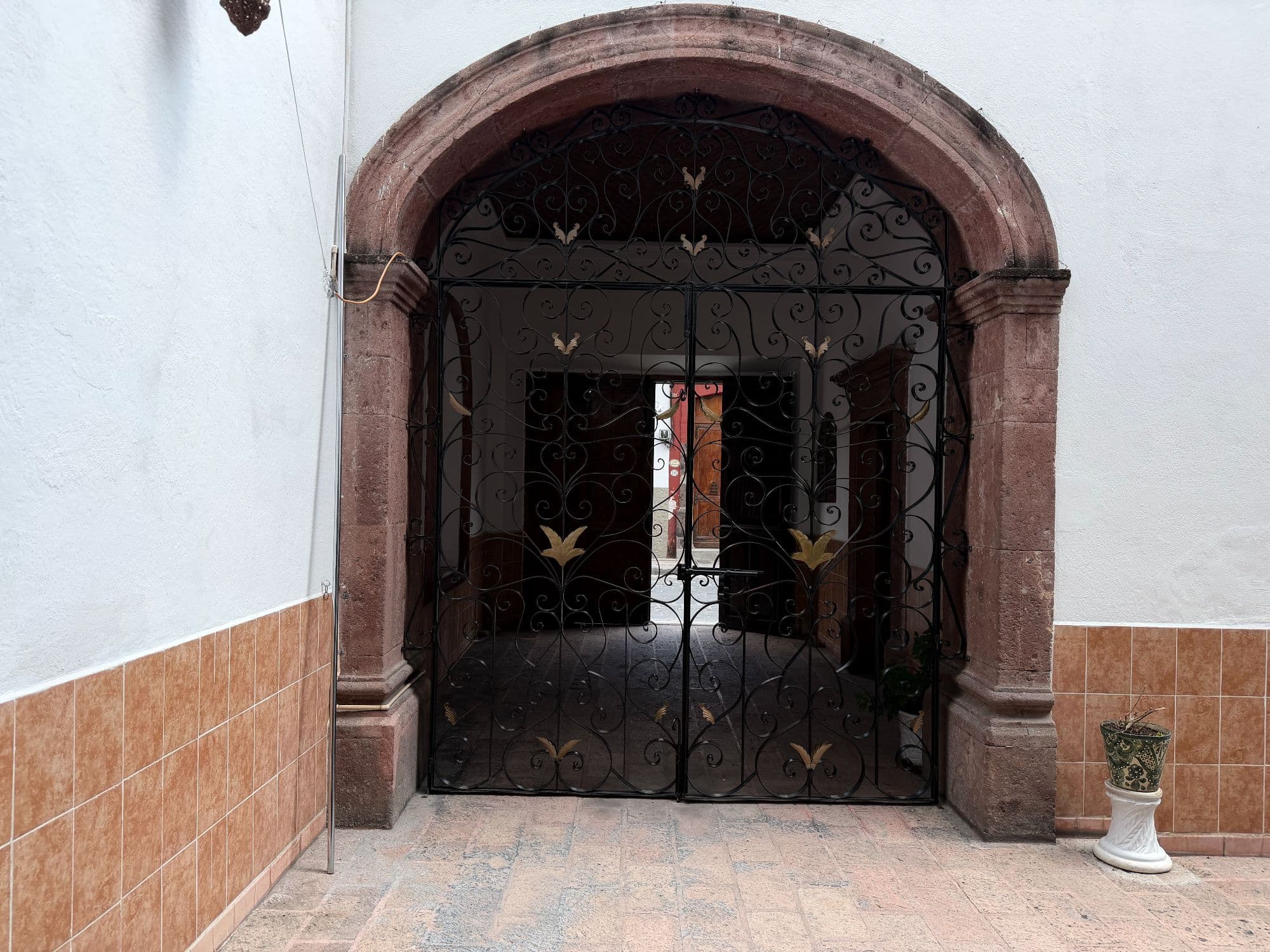 Casa Torres — Centro, San Miguel de Allende — photo 37 — ornate wrought-iron entry portal