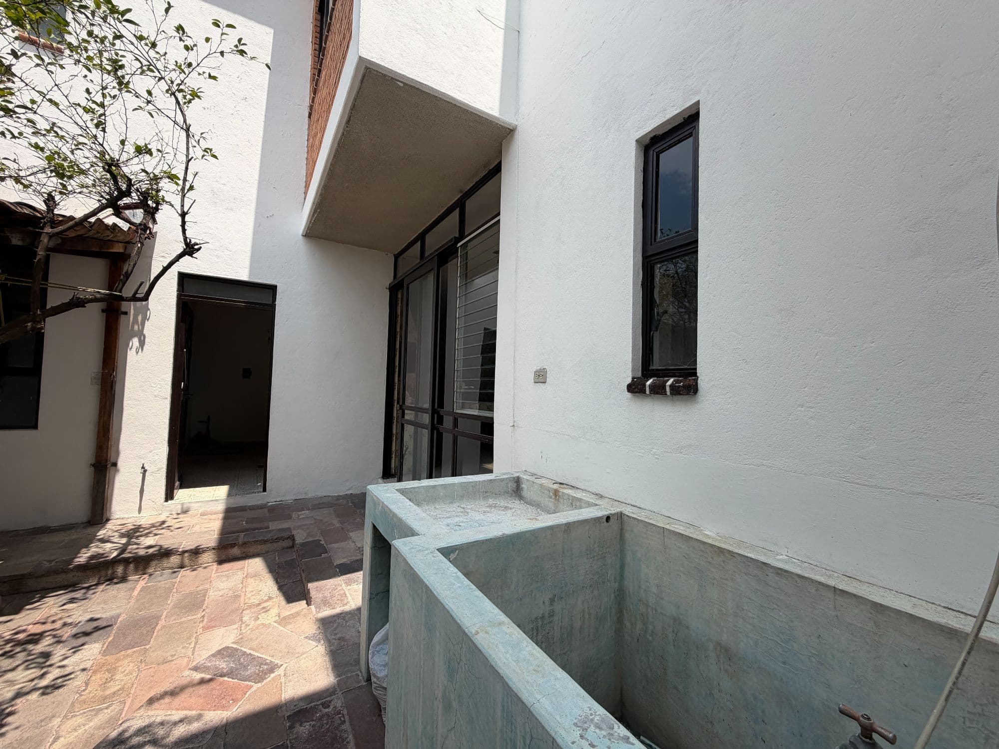 Casa Torres — Centro, San Miguel de Allende — photo 51 — serene courtyard bathed in sunlight