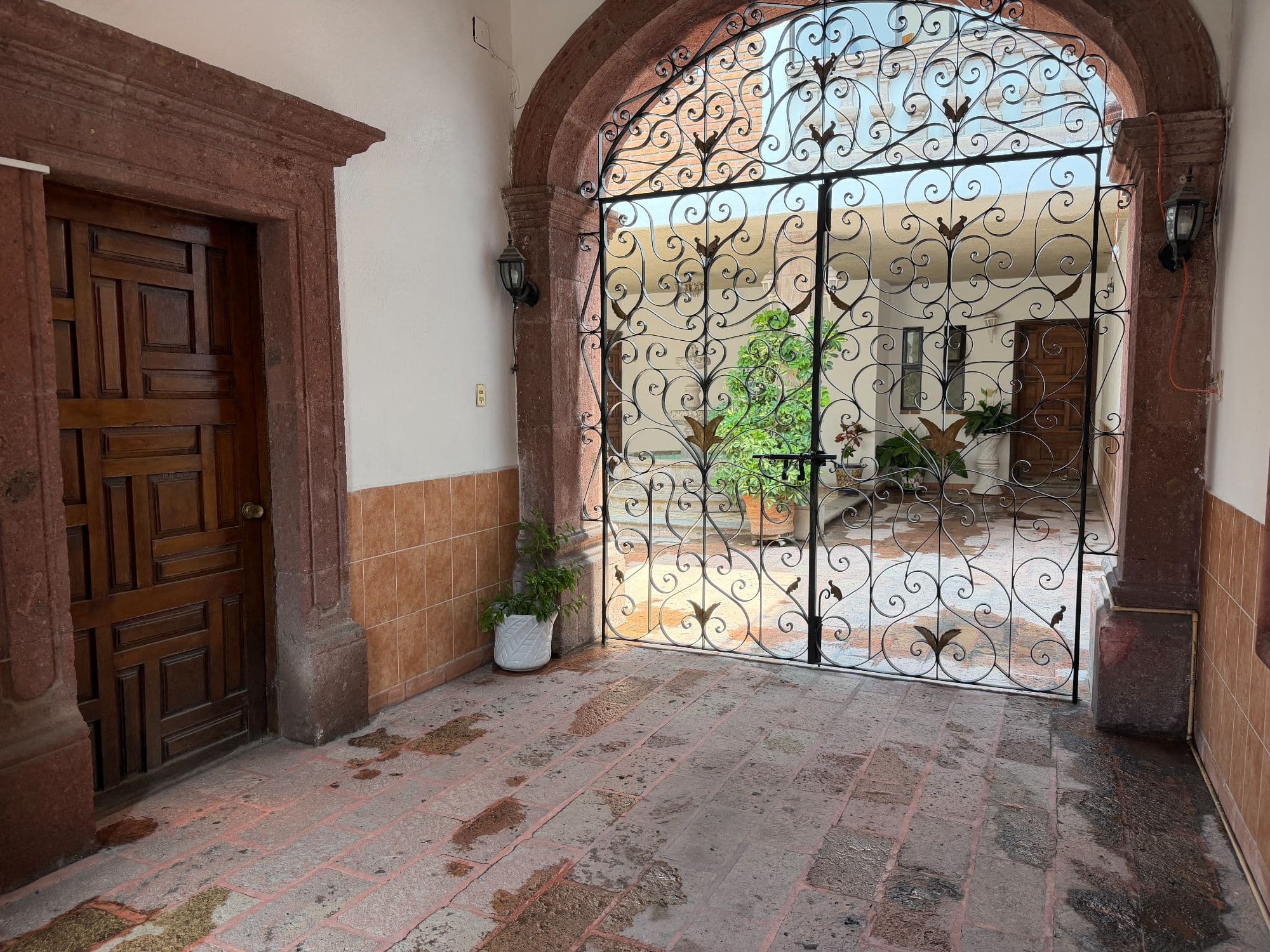 Casa Torres — Centro, San Miguel de Allende — photo 48 — charming courtyard, ornate iron gates