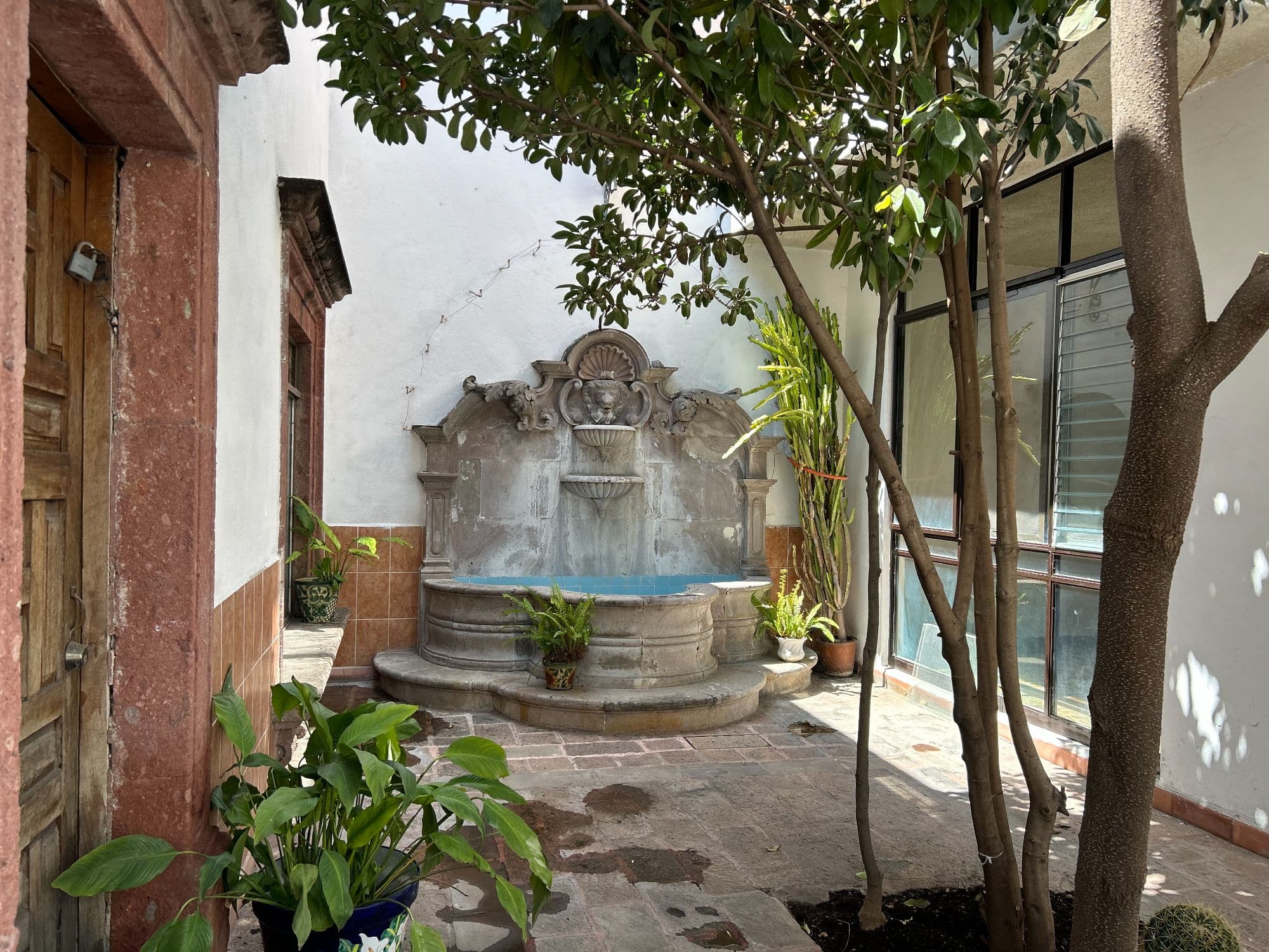 Casa Naranjo — San Miguel de Allende Centro, San Miguel de Allende — photo 31 — charming courtyard, historic stone fountain