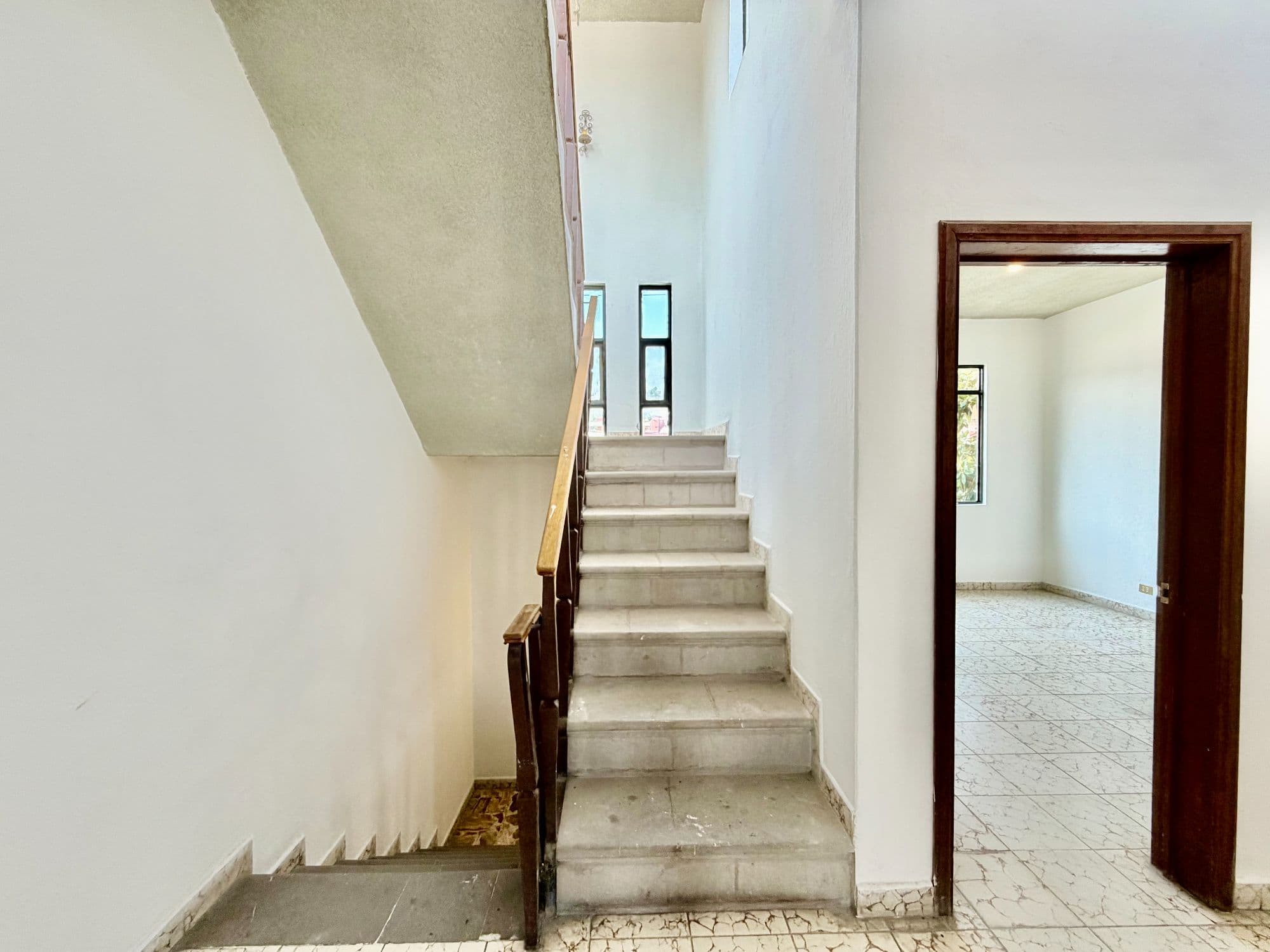 Casa Torres — Centro, San Miguel de Allende — photo 54 — elegant staircase, soaring ceilings, architectural character