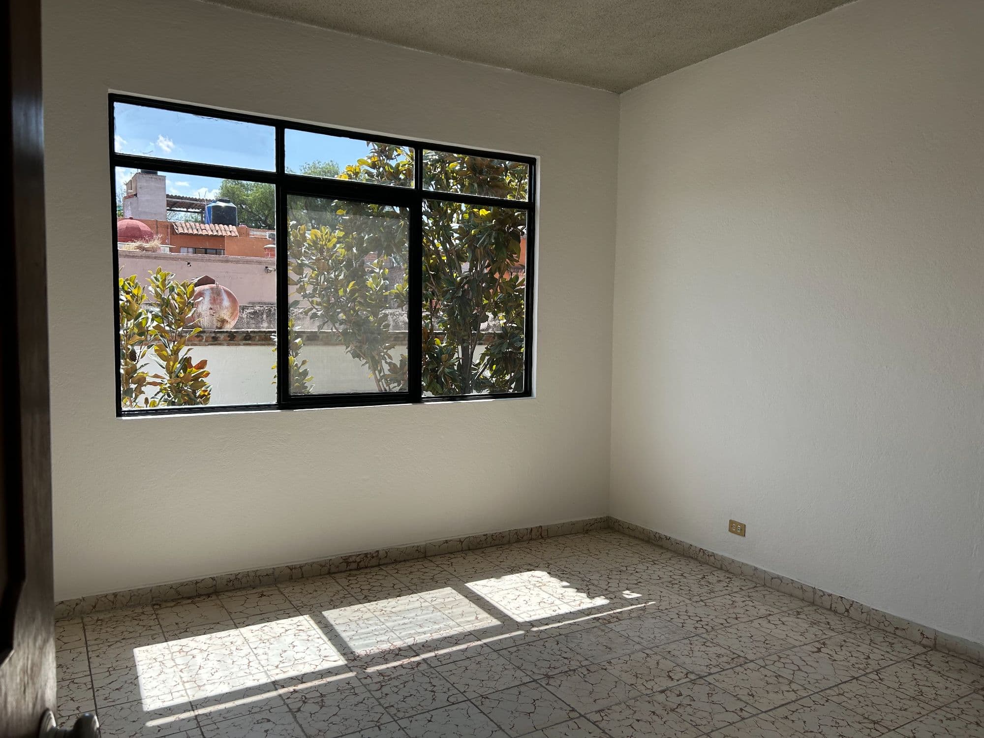 Casa Naranjo — San Miguel de Allende Centro, San Miguel de Allende — photo 23 — sun-drenched room, verdant rooftop views
