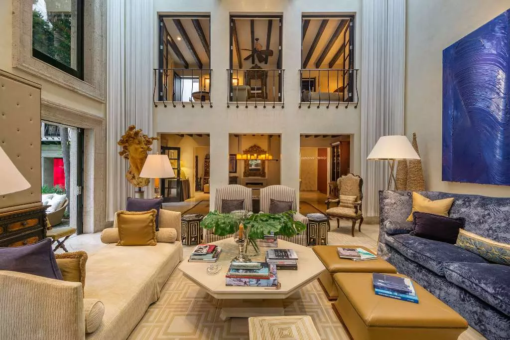 Casa Stream — Centro, San Miguel de Allende — photo 11 — soaring atrium with golden elegance