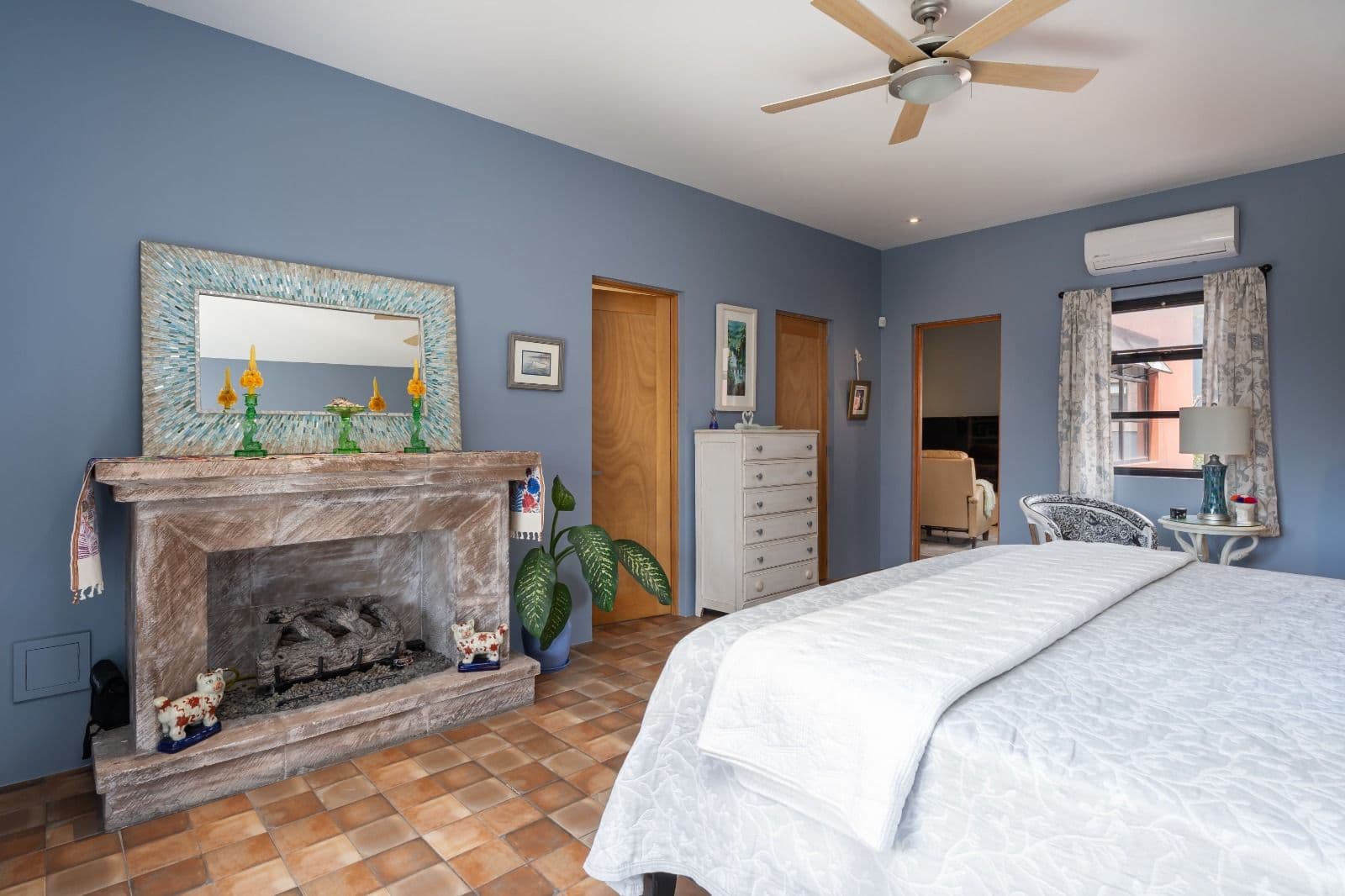 Casa Picaflores — Guadalupe, San Miguel de Allende — photo 25 — serene bedroom with working fireplace