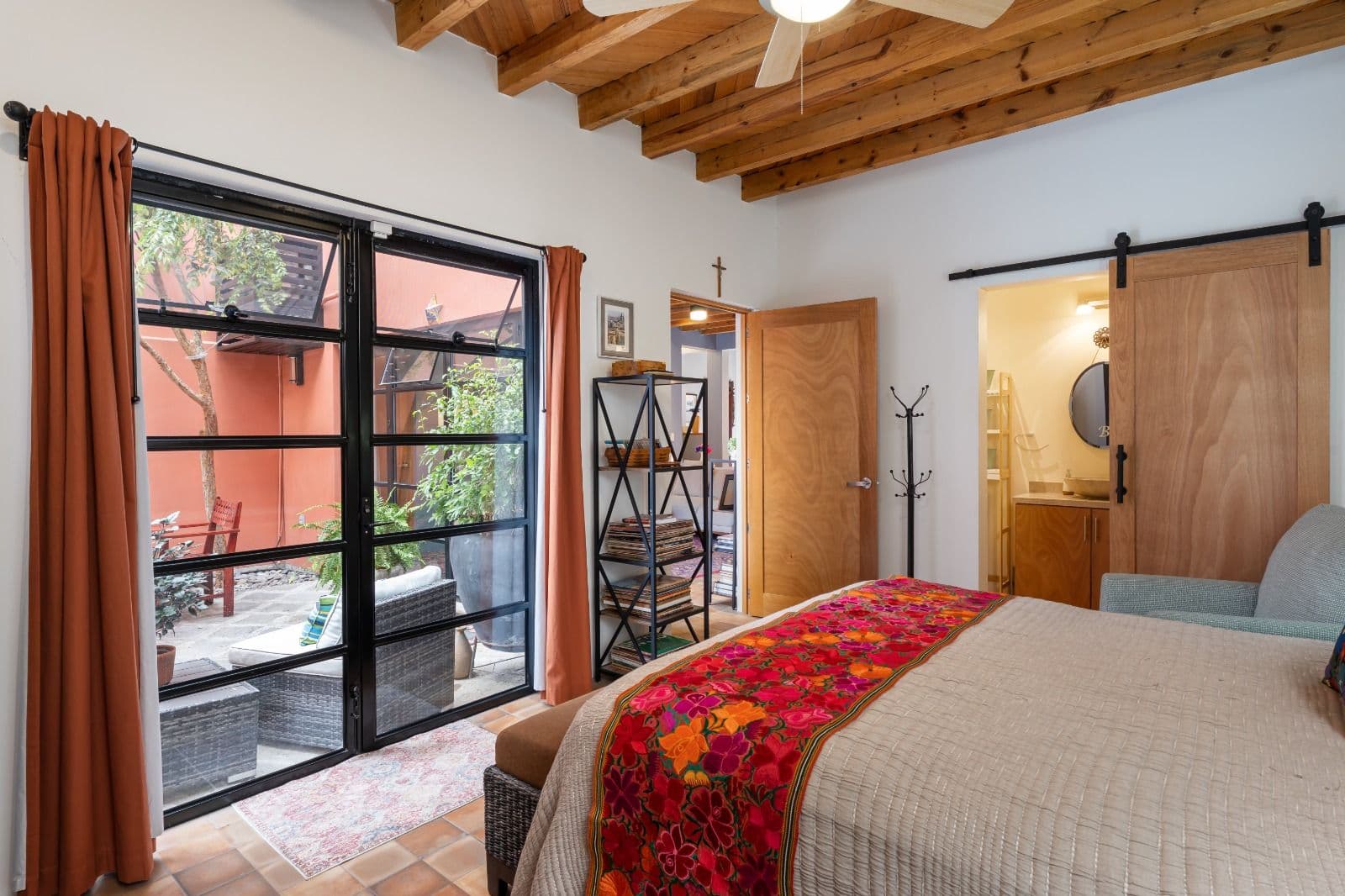 Casa Picaflores — Guadalupe, San Miguel de Allende — photo 15 — rustic-chic bedroom with courtyard views