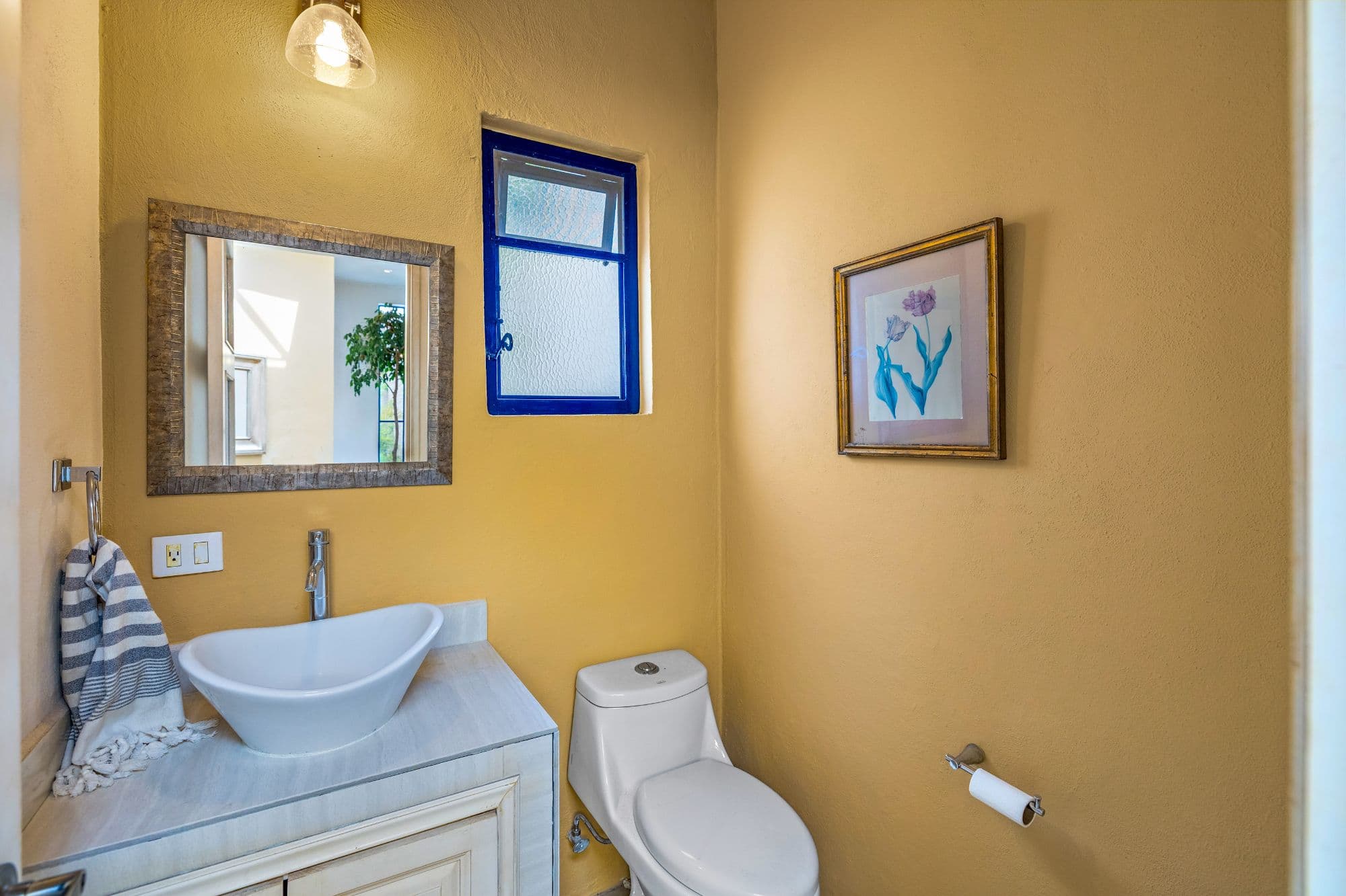 Casa del Agua — Atascadero (Arcos de San Miguel), San Miguel de Allende — photo 2 — charming powder room, sun-drenched walls