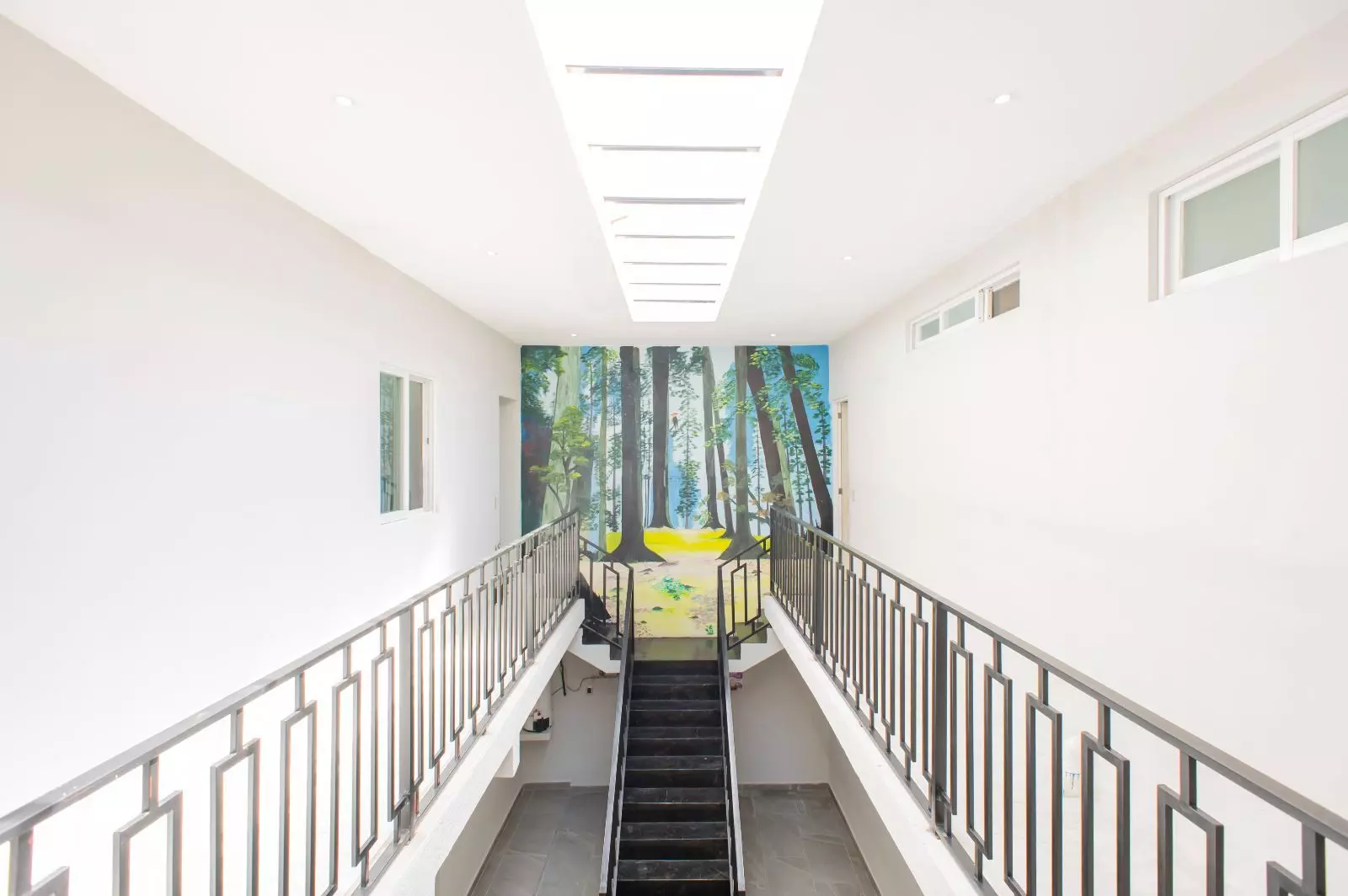Casa Sara — Lindavista, San Miguel de Allende — photo 19 — luminous gallery with soaring skylights