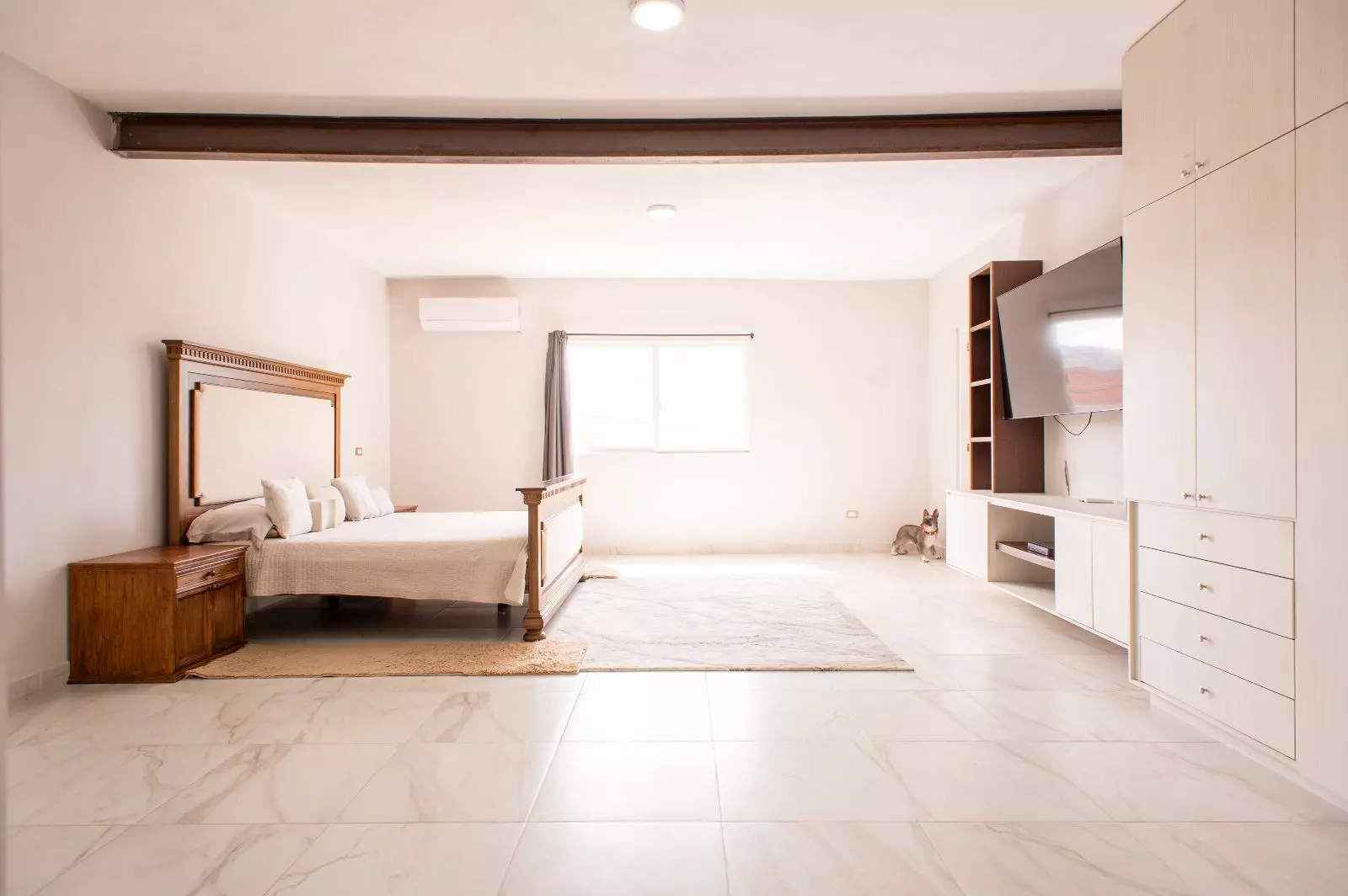 Casa Sara — Lindavista, San Miguel de Allende — photo 11 — luminous master suite, classical elegance