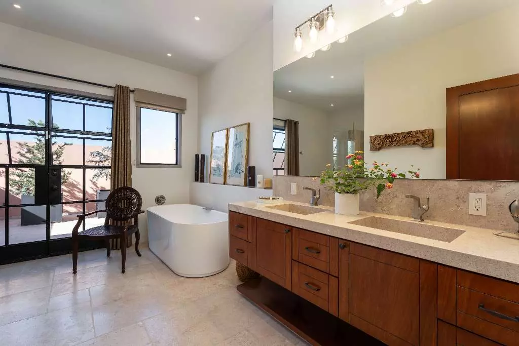 Casa Nobel — Guadiana, San Miguel de Allende — photo 2 — spa-inspired master bath with garden views